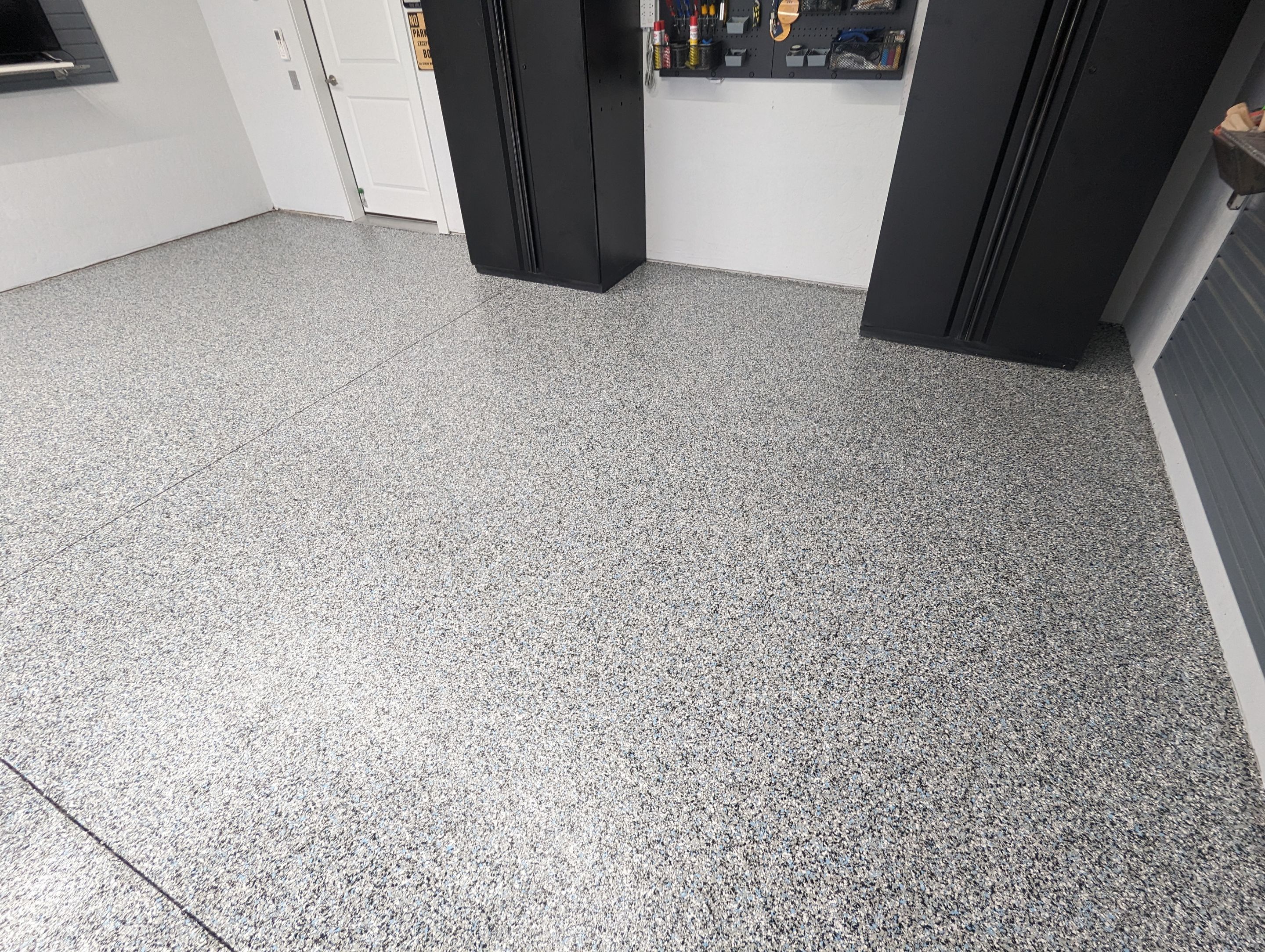 Garage Transformation using Custom domino w/ baby blue by Croc Coatings, LLC