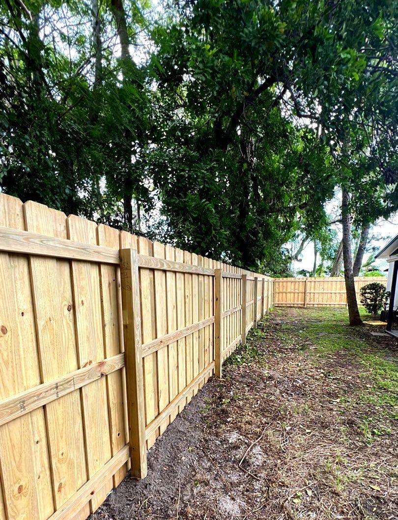 Wood Fence Installation using Board on Board Wood Fence by Asap fence and gates, LLC