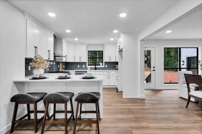 Modern Marietta Home Transformation with Custom Kitchen and Vertical Siding
