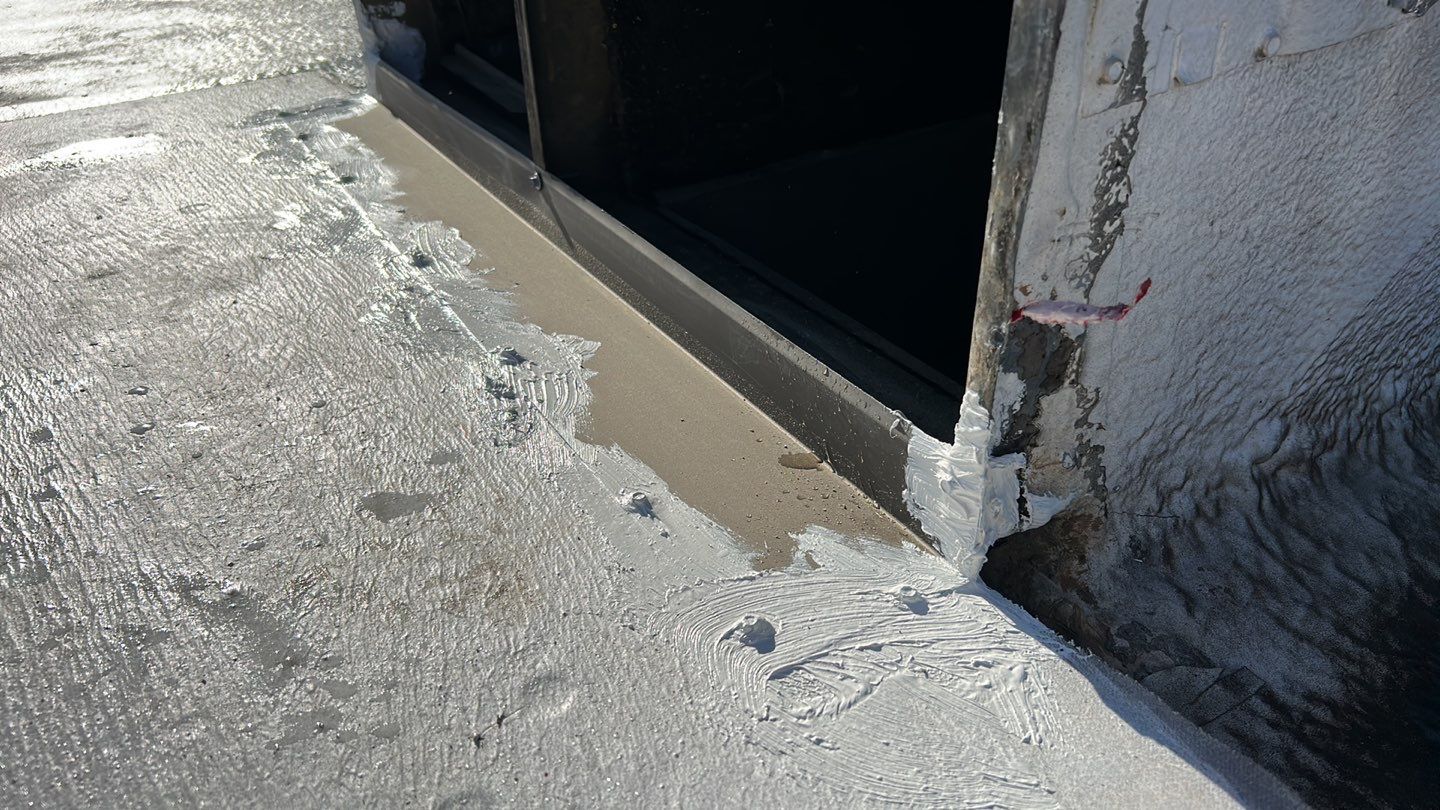 Foam Refurbish using Conklin Benchmark/PUMA XL coatings and spray foam; Also metal roofing around parapet wall by Straight Edge Roofing Inc