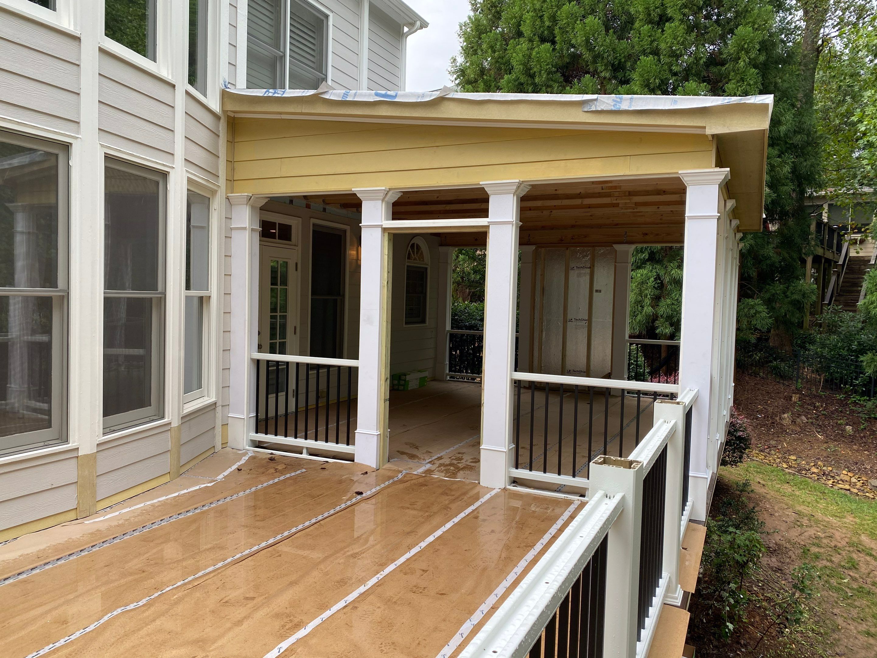Elevated Screened-in Porch and Composite Deck Construction in Mableton by Swift Home Renovations