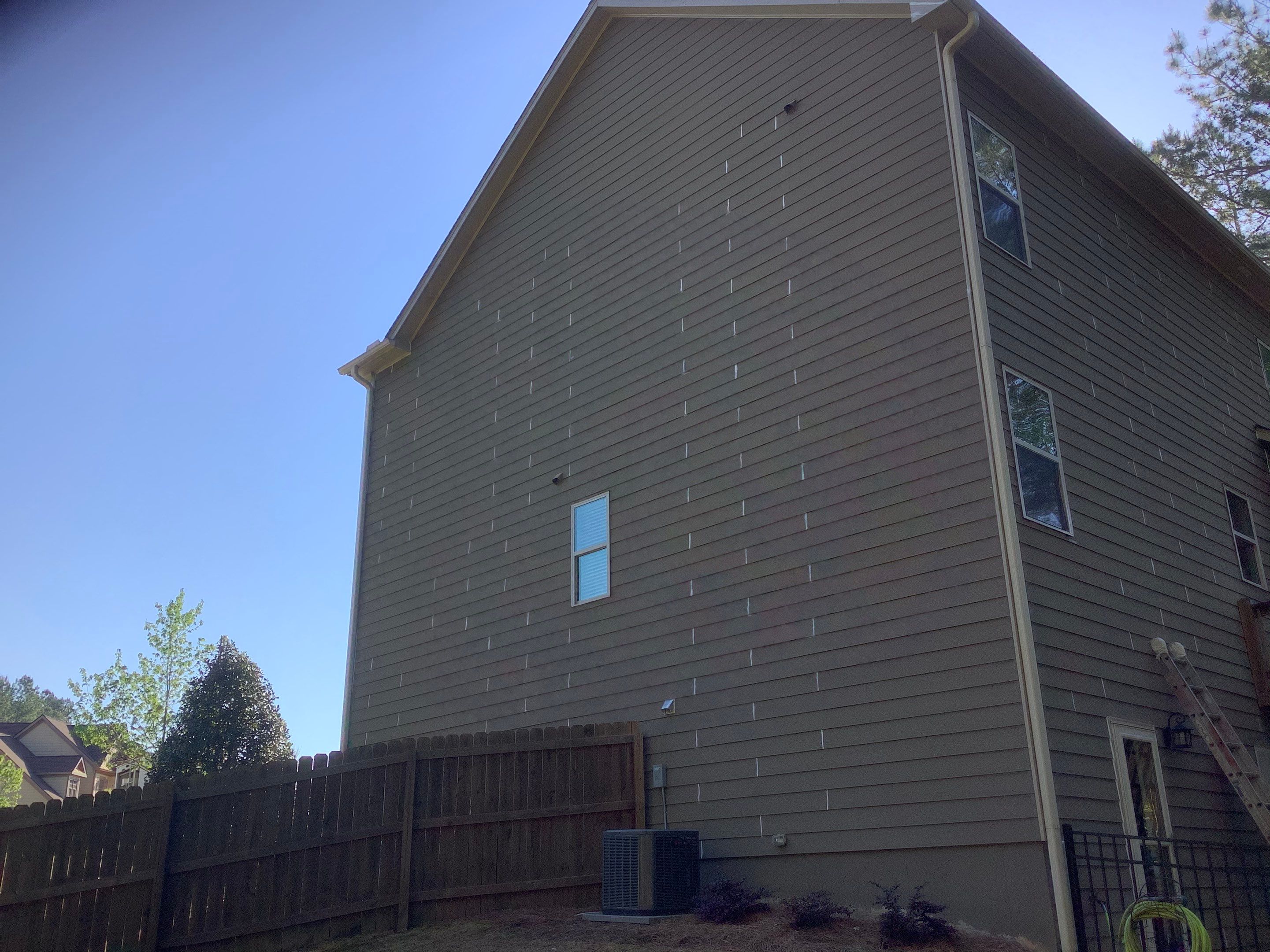 Multi-Surface Exterior Painting for Two-Story Residence in Powder Springs by Swift Home Renovations