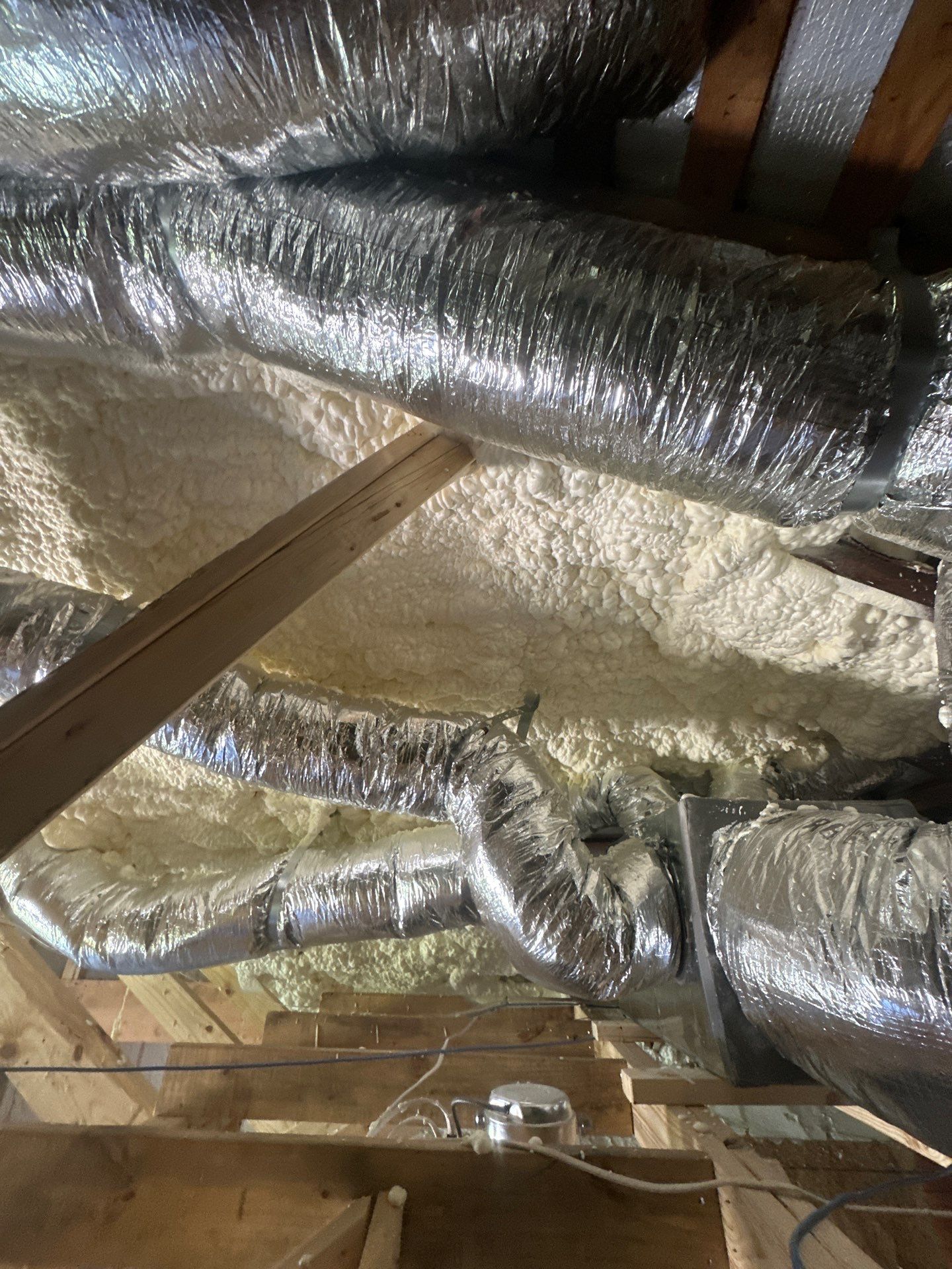 Full encapsulation with open cell spray foam on this custom home in Dallas by Apex Insulation Solutions