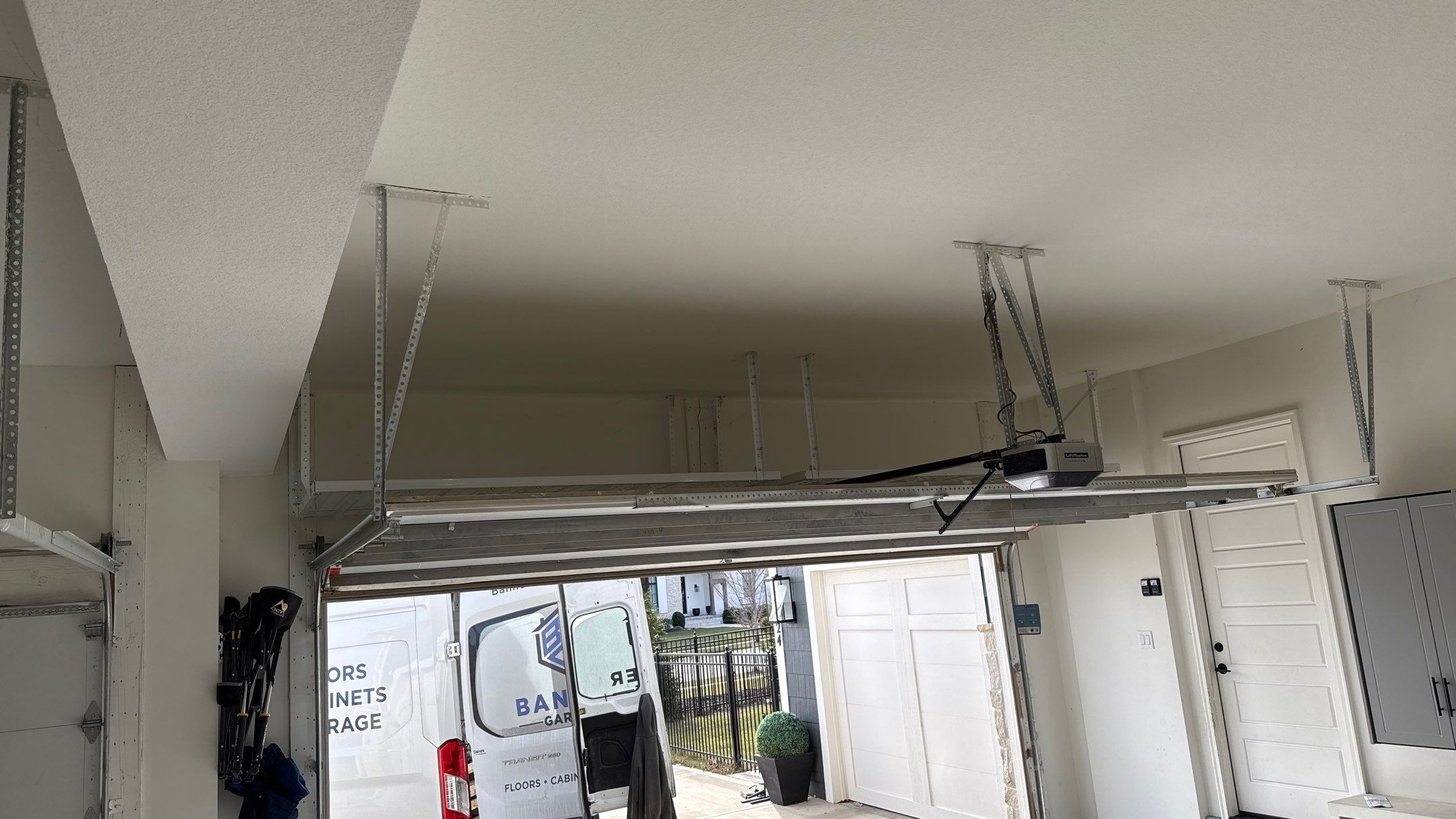 Nick's New Floor & Storage Looks Beautiful by Banner Garage