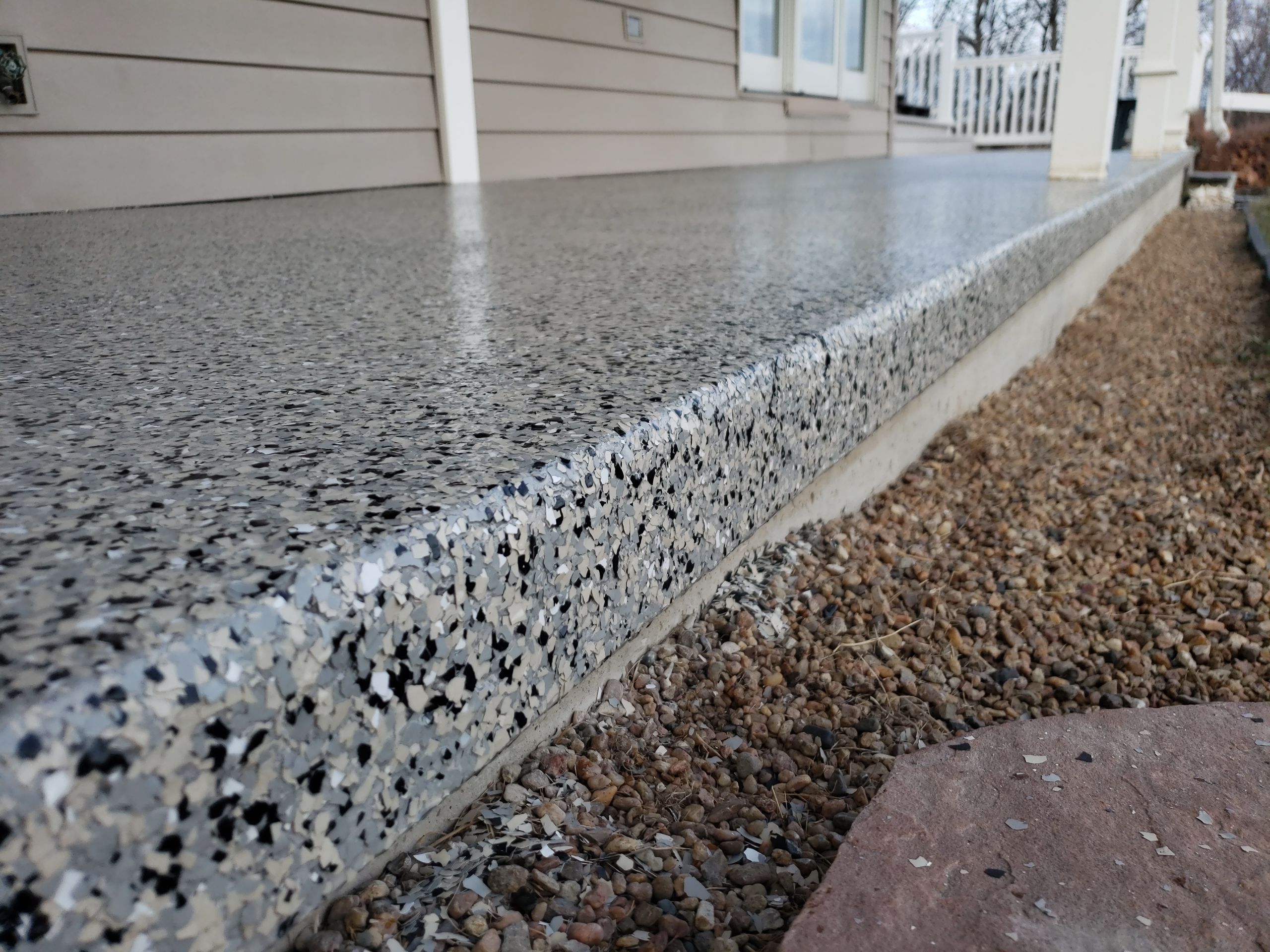 St. Joseph -- Front Patio and Garage Epoxy Garage Coating System by Big Red Decorative Concrete, LLC