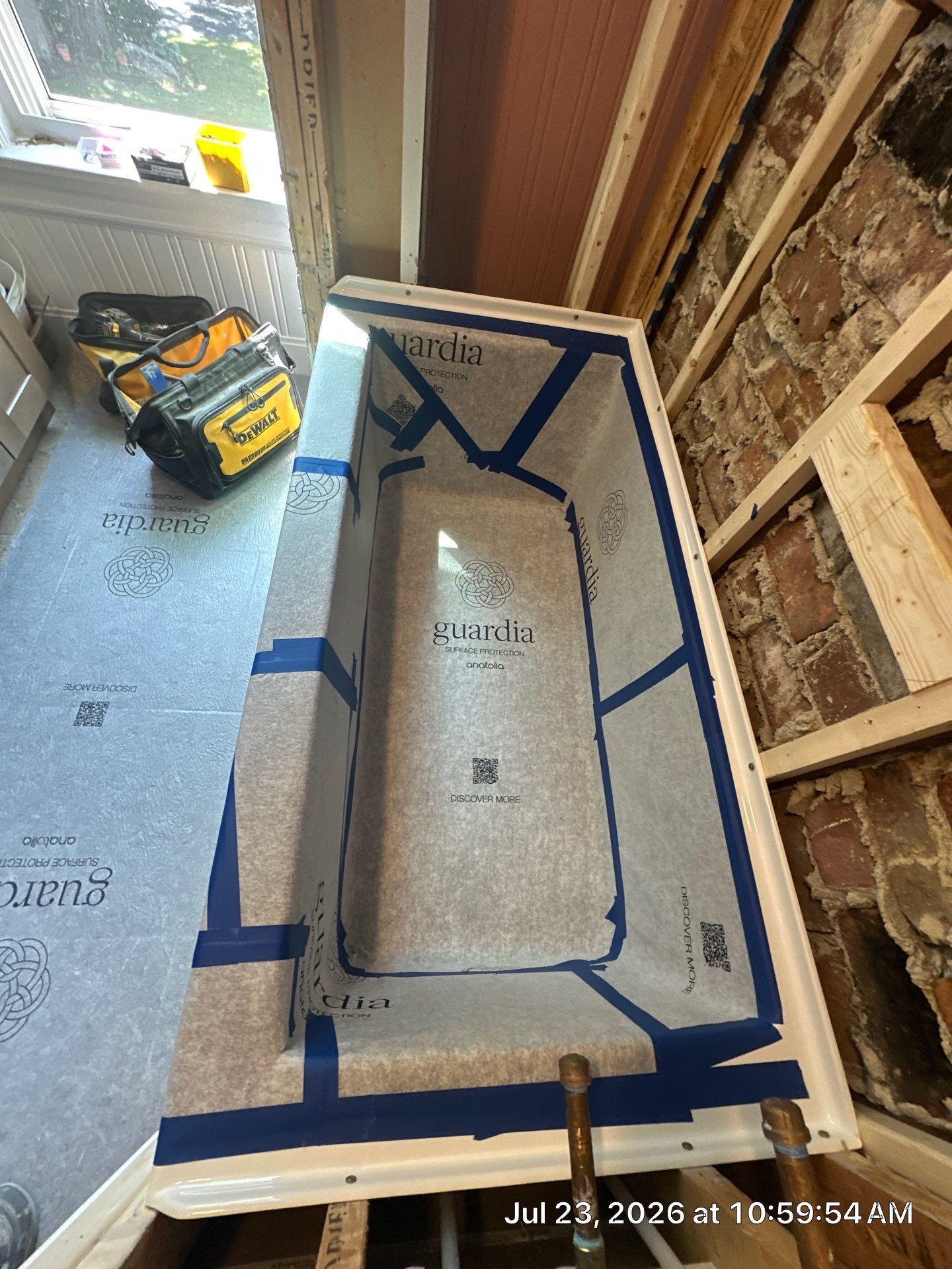 Manchester Bathroom Remodel with Subway Tile Surround and Granite Vanity by Renovatic LLC