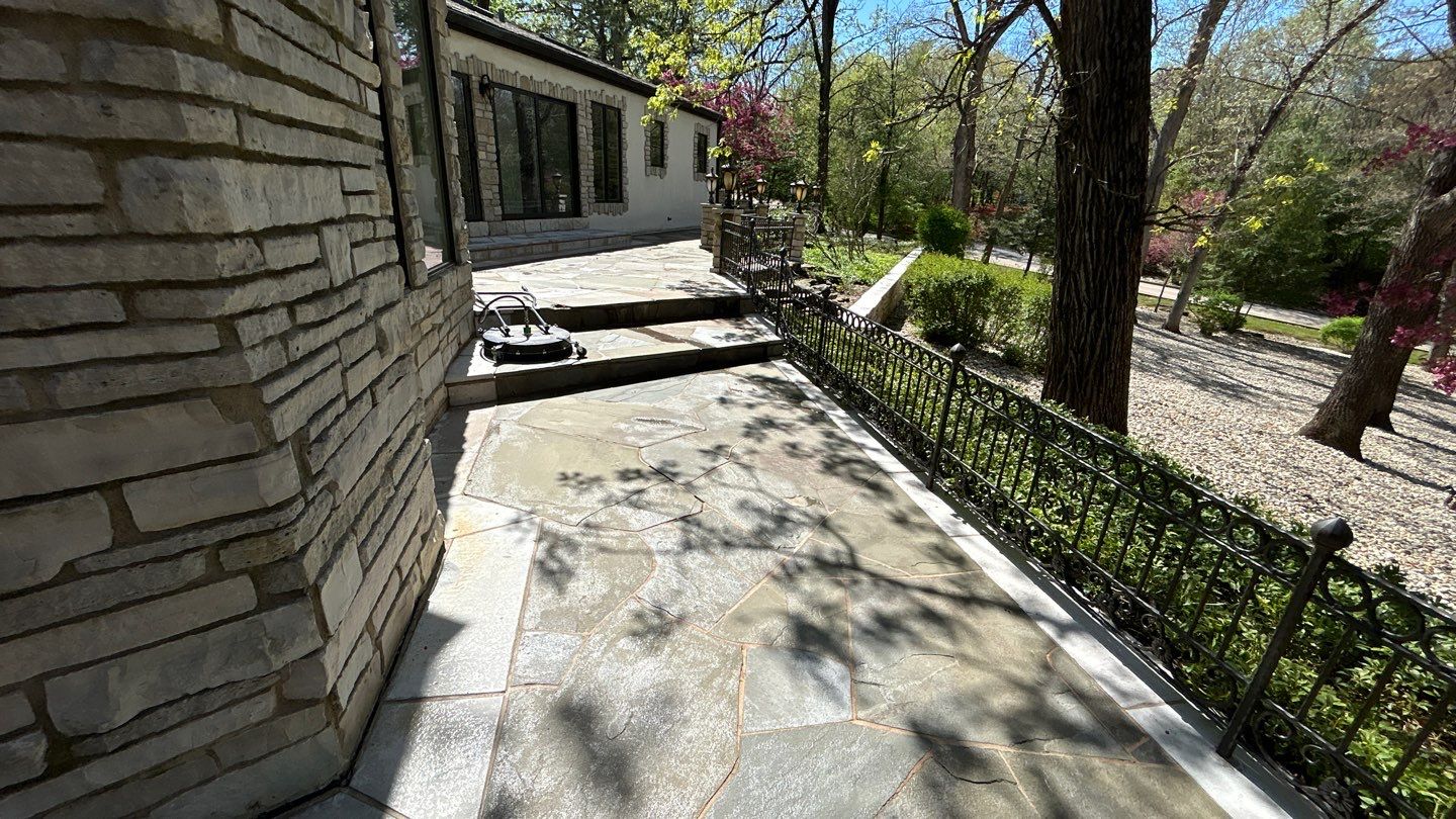 natural stone using Algaecide, soft wash soap by Northern Power Washing LLC.