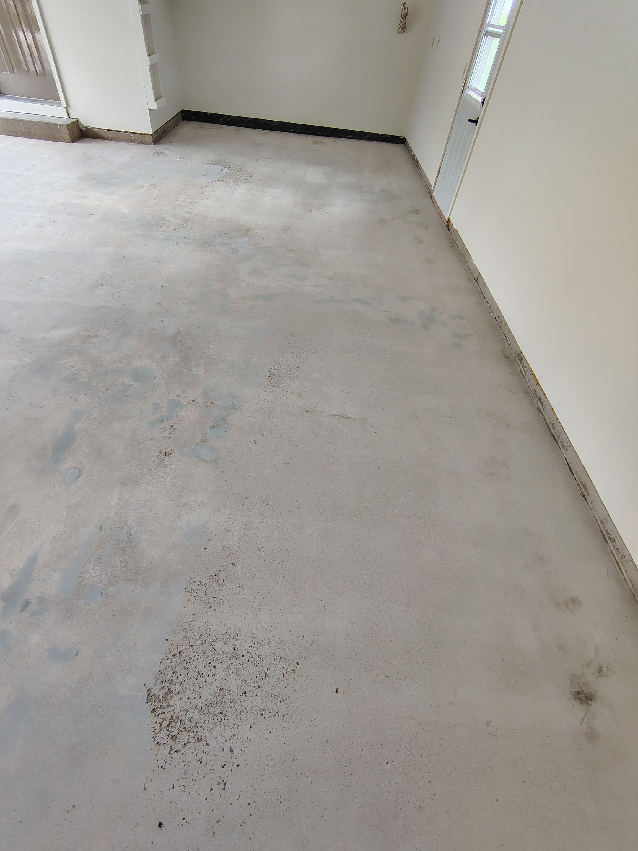 Full-Flake Epoxy Garage Floor Coating Installation in Sioux Falls by Select Painting, Coatings & Garage Cabinets