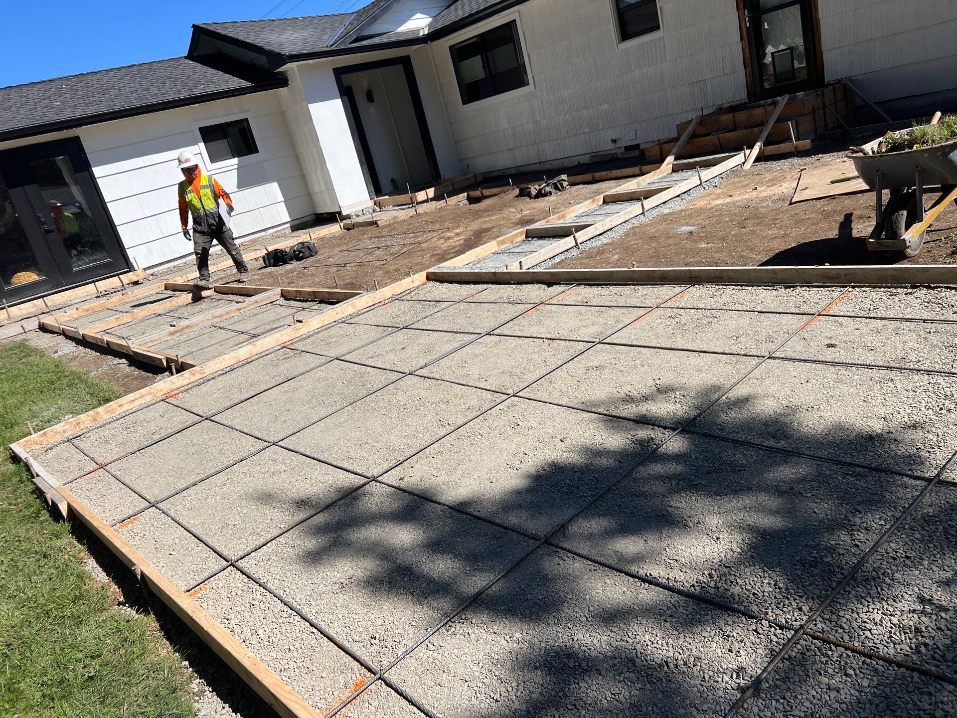 John | Concrete Backyard Walkway by Jireh Asphalt & Concrete Inc 