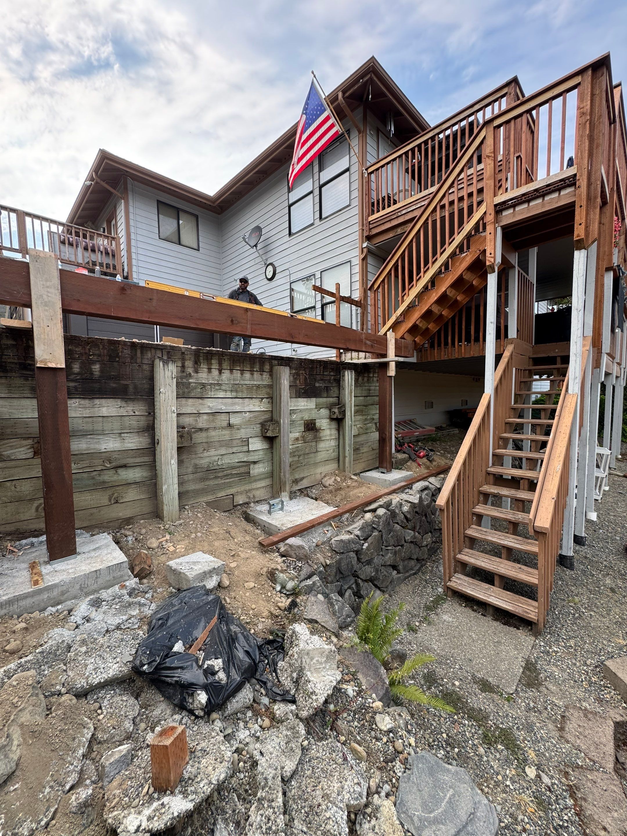 Tacoma Custom Composite Deck and Hot Tub Surround with Retaining Wall by Emerald City Energy 