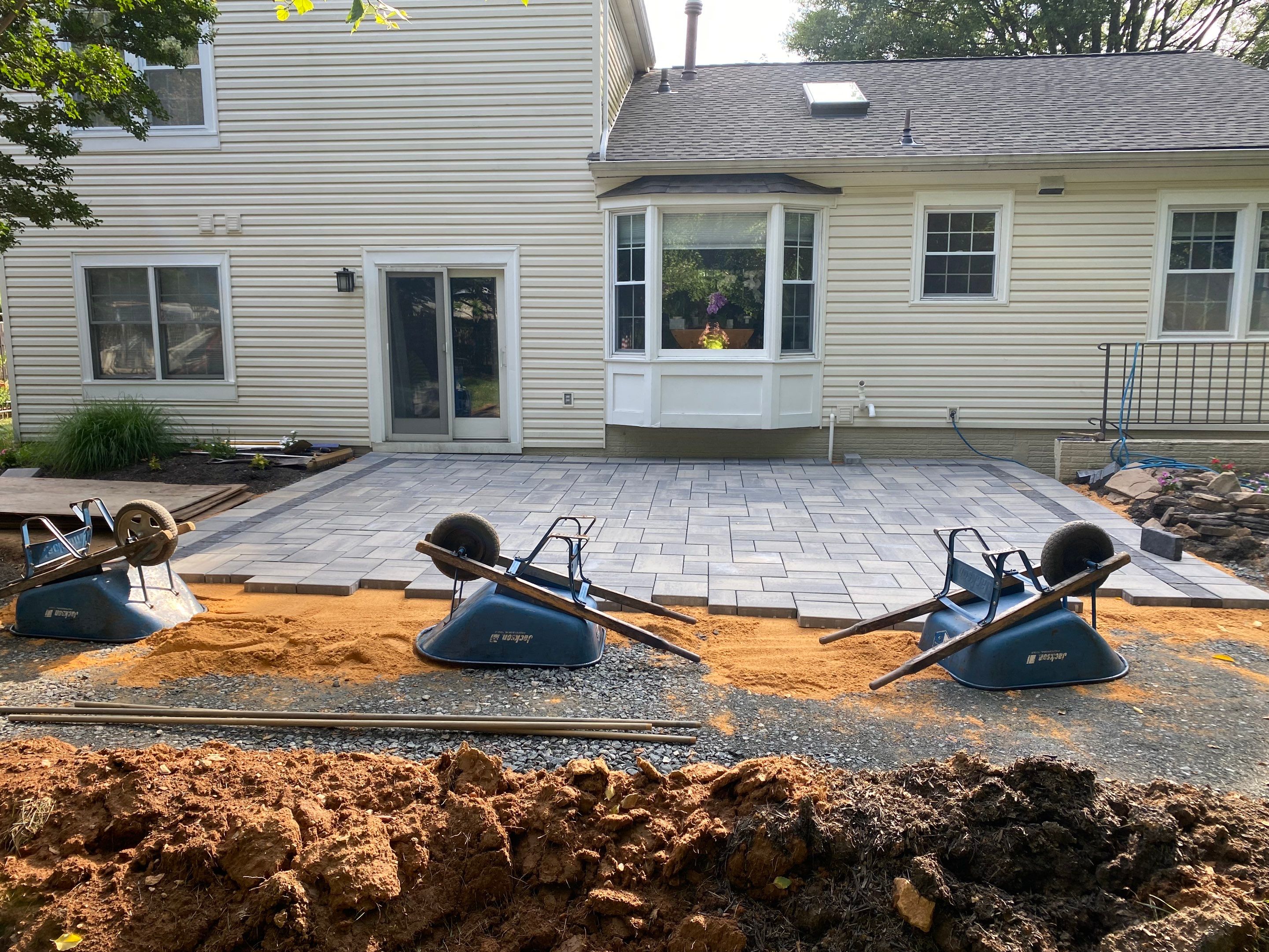 Backyard Transformation using Techo-Bloc Pavers by The Smet Companies, LLC
