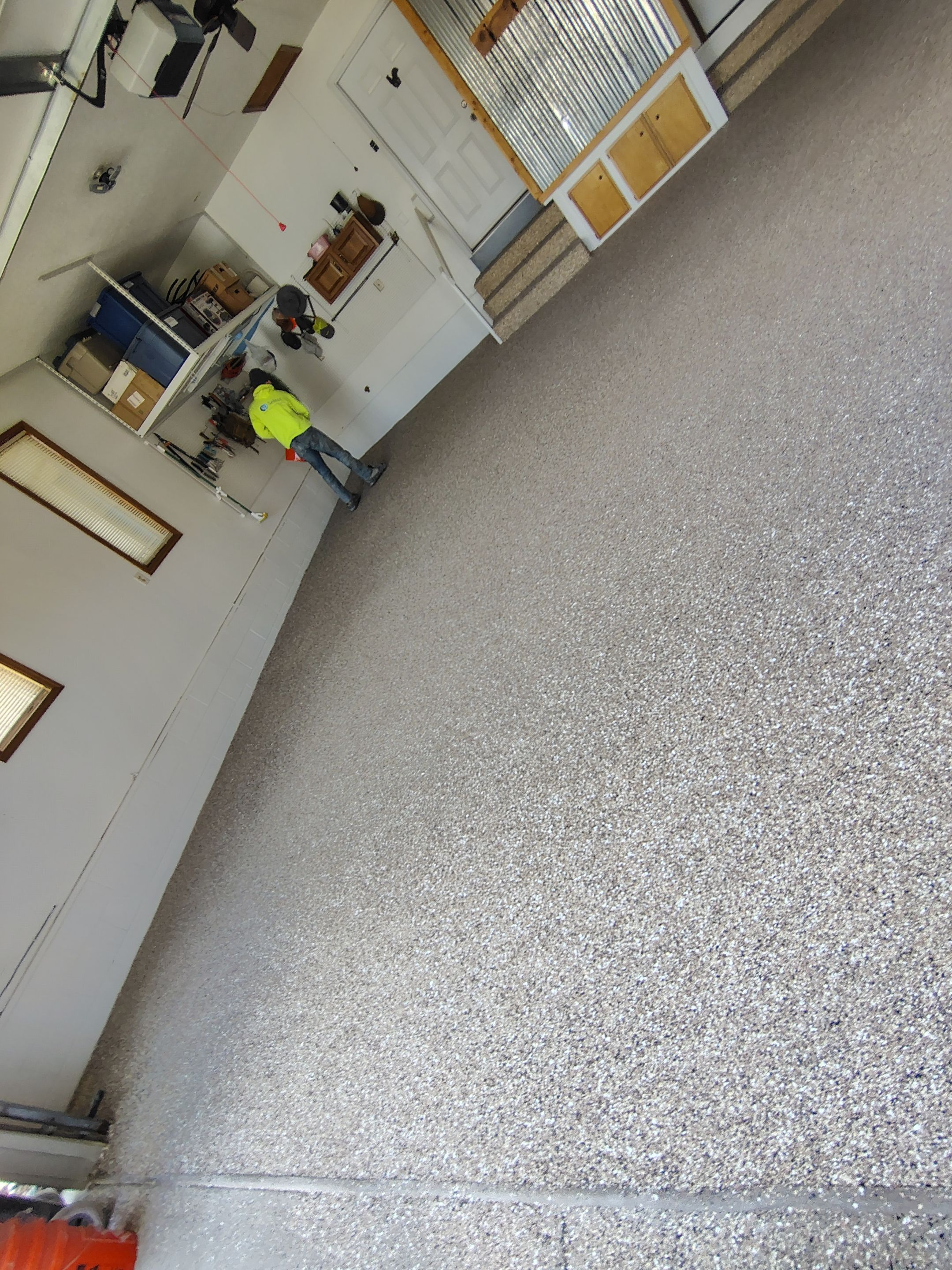 Multi-Colored Flake Epoxy Garage Floor Coating and Crack Repair by Select Painting, Coatings & Garage Cabinets
