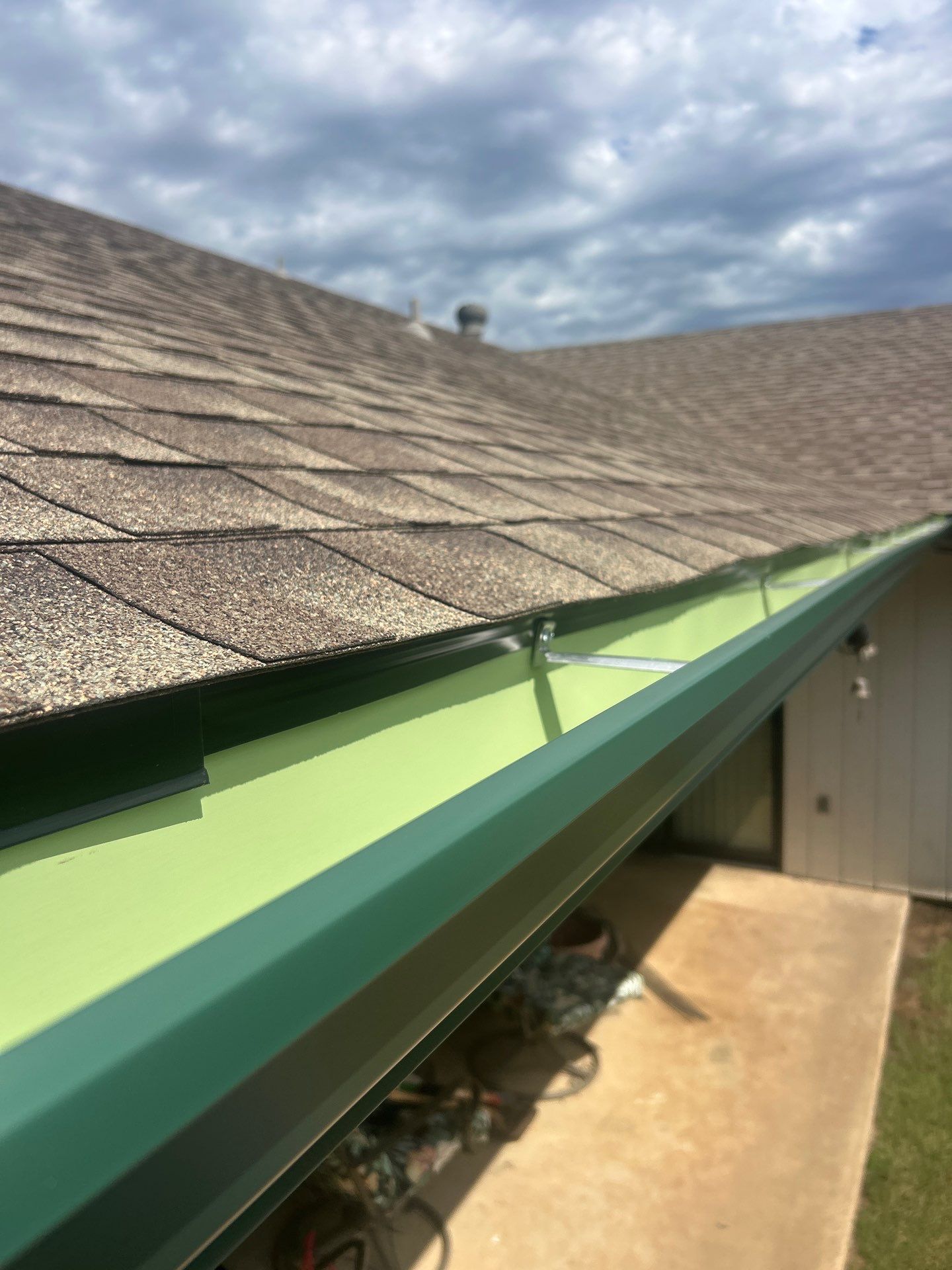 Eaves and gutter replacement in Yukon by McCann's Roofing and Construction