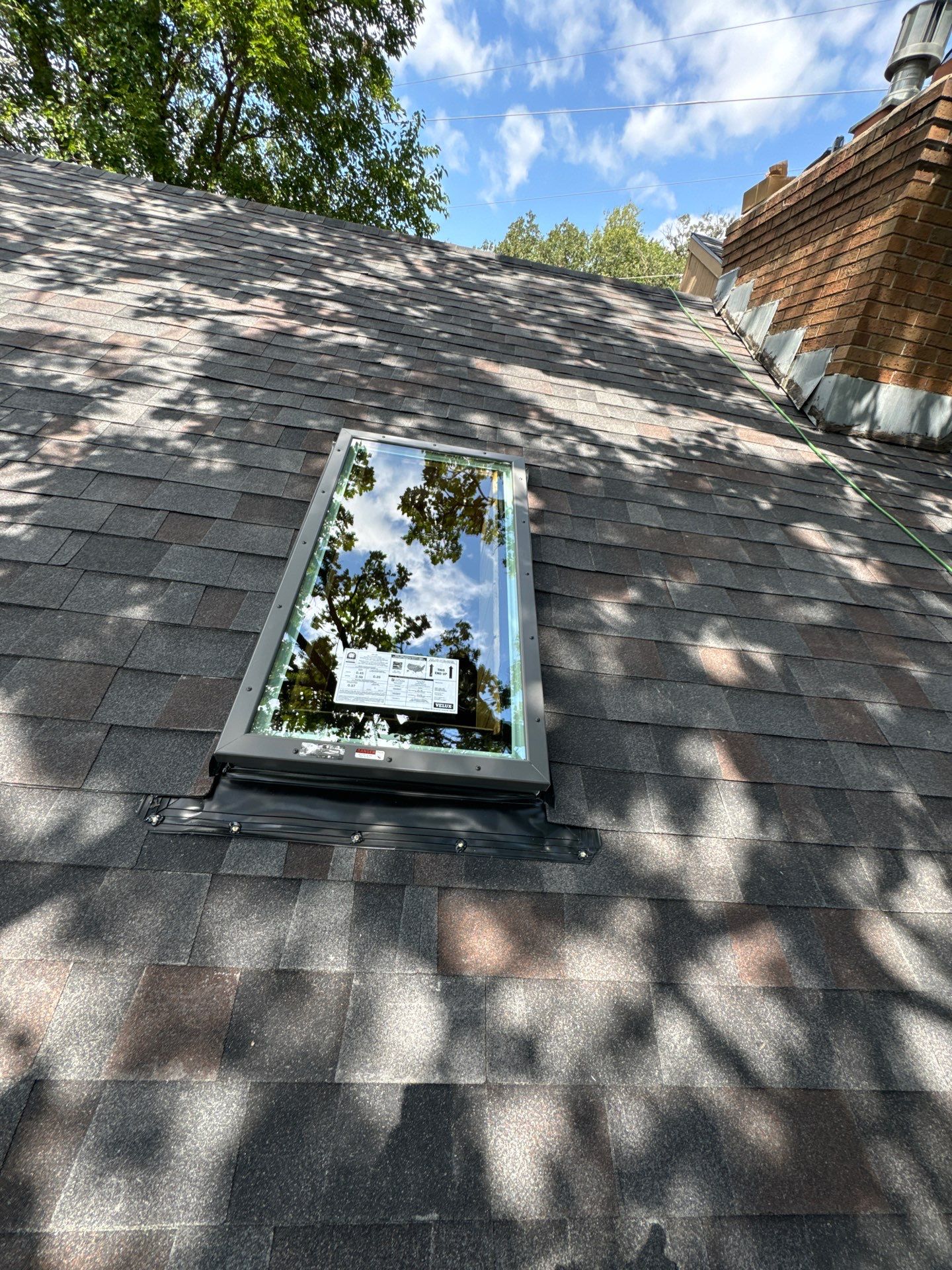 Malarkey Roof Replacement & Skylight Installation – Omaha, NE by Crows Roofing LLC