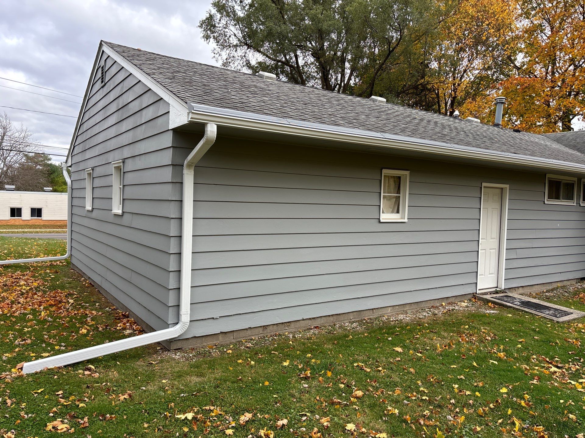 Gutter Installation using Seamless Gutters- Aluminum with Gutter Protection by Acme Exteriors