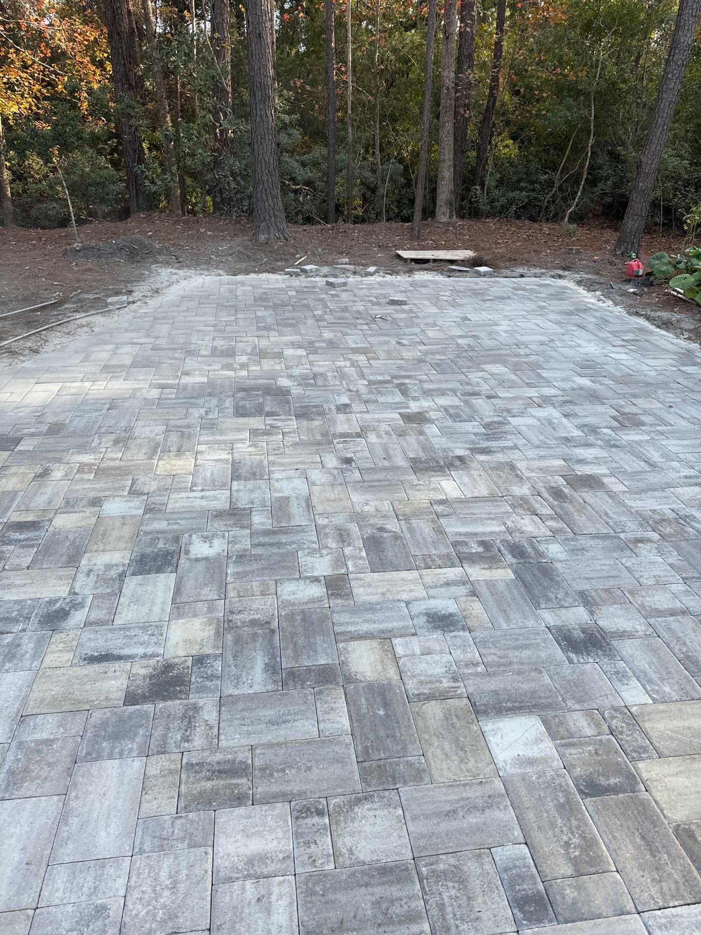 Custom Paver Driveway and Textured Pool Deck Installation in Hilton Head Island by Lowcountry Scapes, LLC