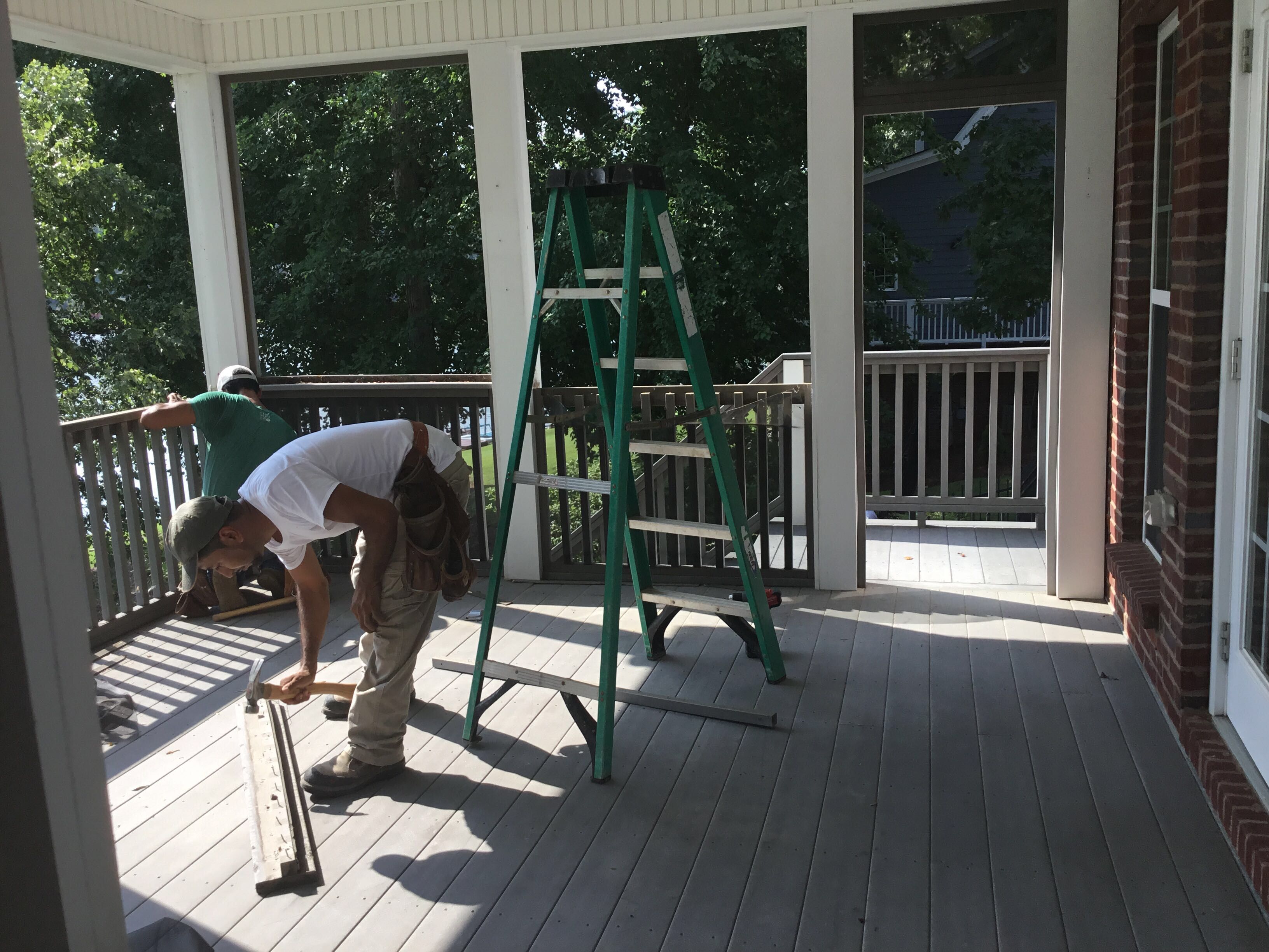 Elevated Composite Deck and Screened Porch Construction in Newnan by Swift Home Renovations