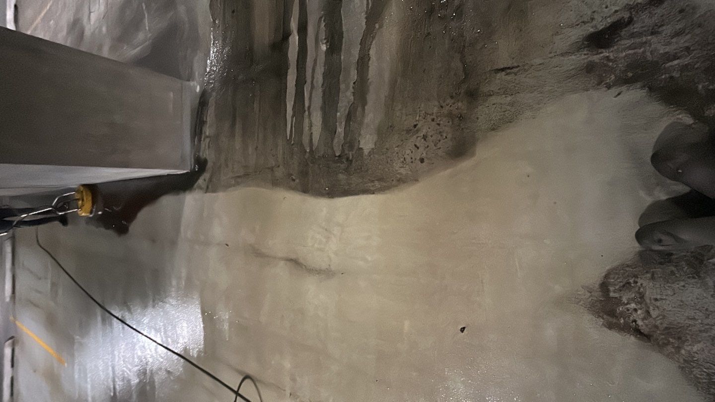Parking garage using Hot water by Northern Power Washing LLC.