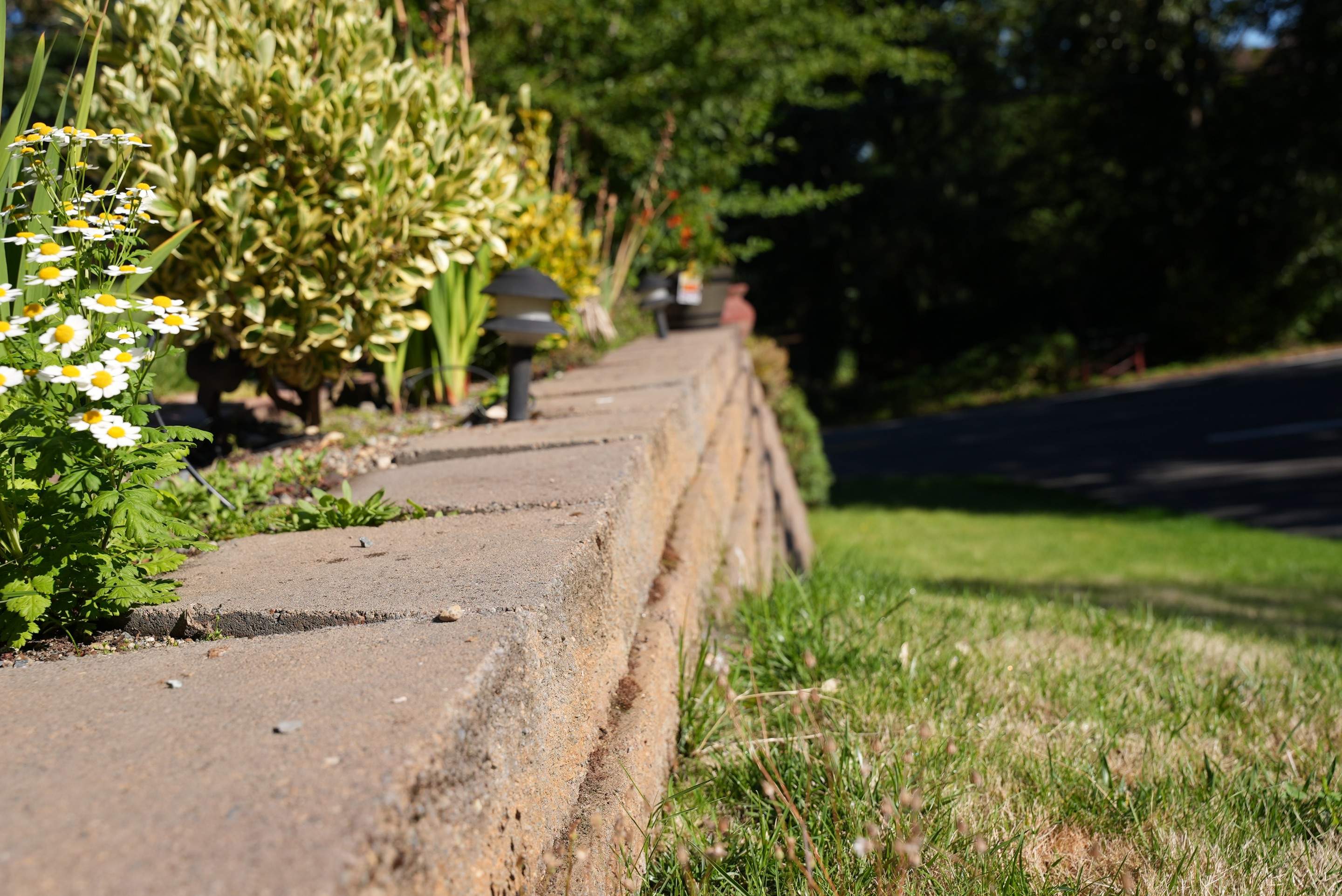 Mehta | Tiled Driveway with Sealer & Retaining Wall  by Jireh Asphalt & Concrete Inc 