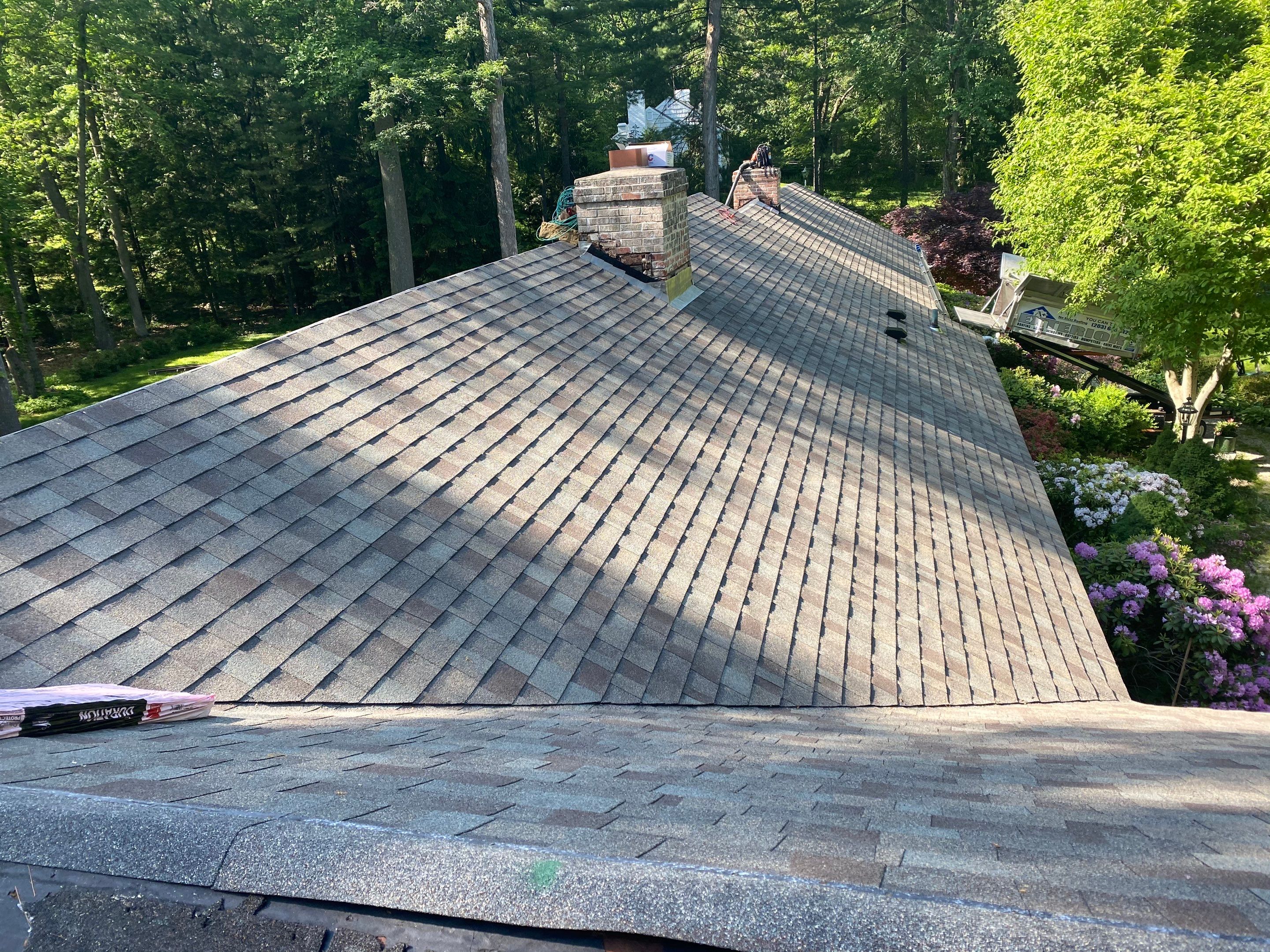 Commercial Roofing Installation using Owens Corning Duration Driftwood by A Plus Exterior