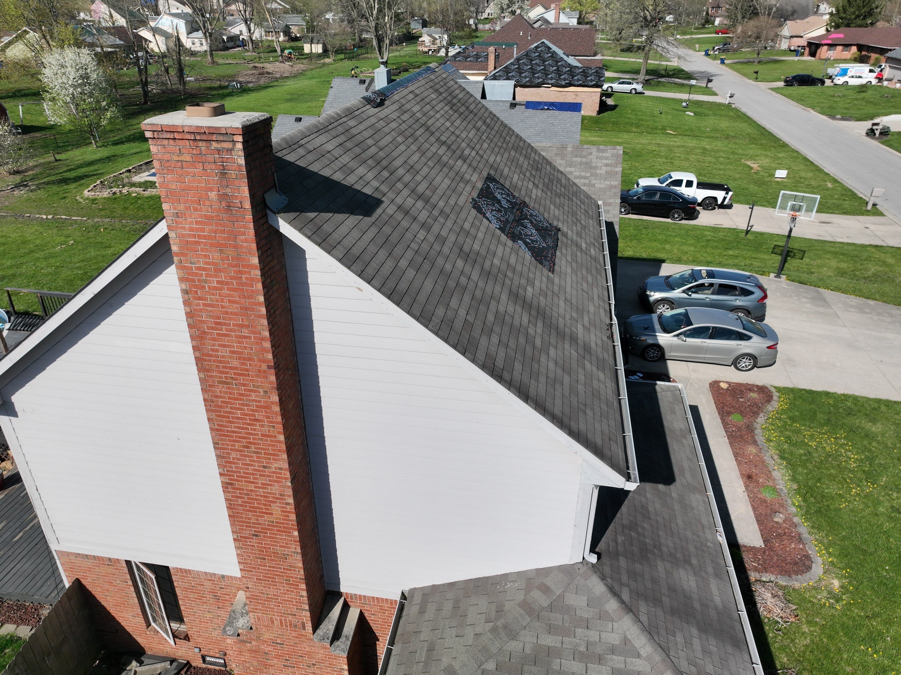Tornado damage in Whiteland. Roof replacement, James Hardie siding, exterior paint, gutters, windows, doors by 317 Roofing & Restorations