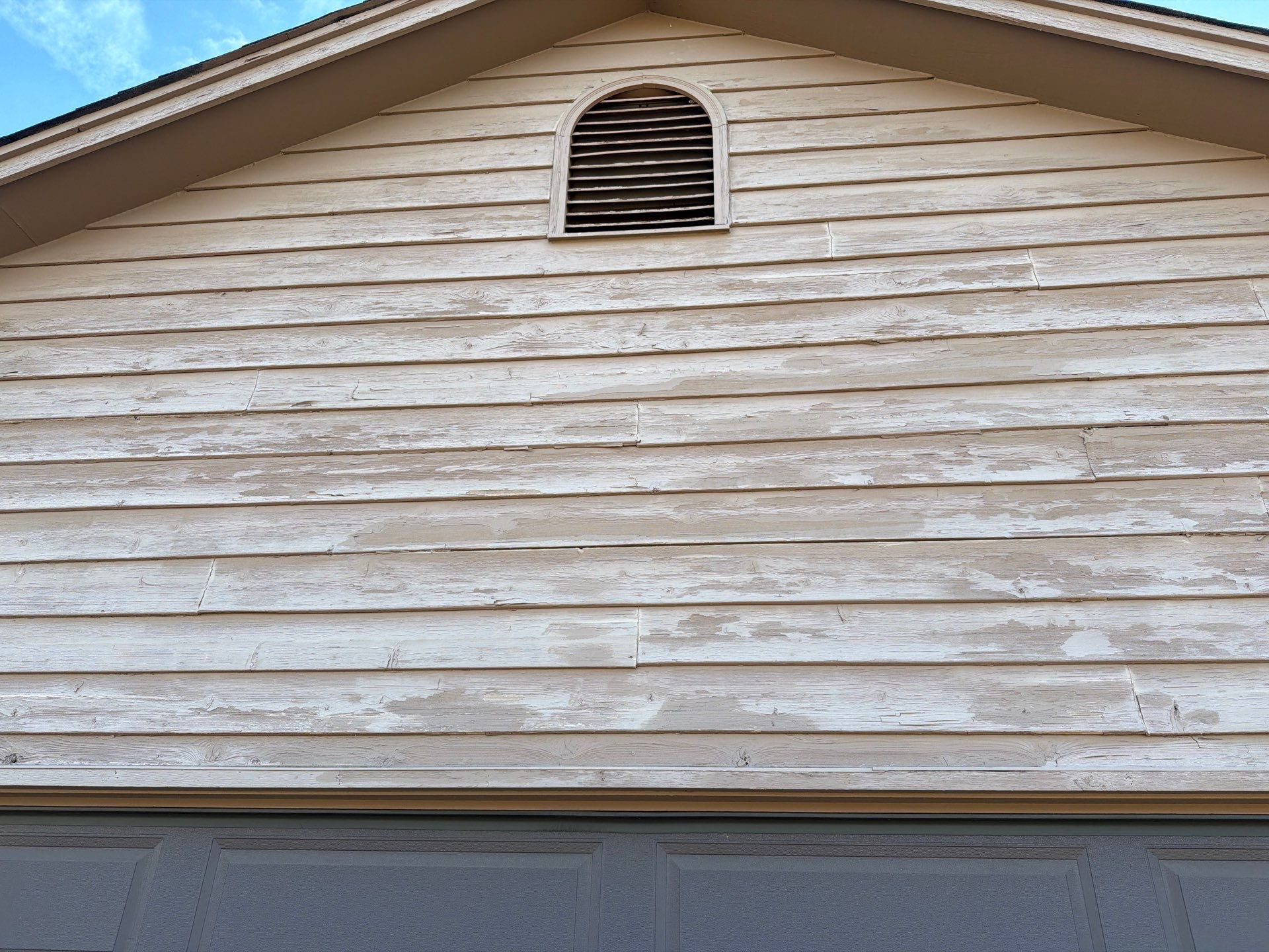Wood Siding Restoration and Exterior Painting in Sioux Falls by Select Painting, Coatings & Garage Cabinets