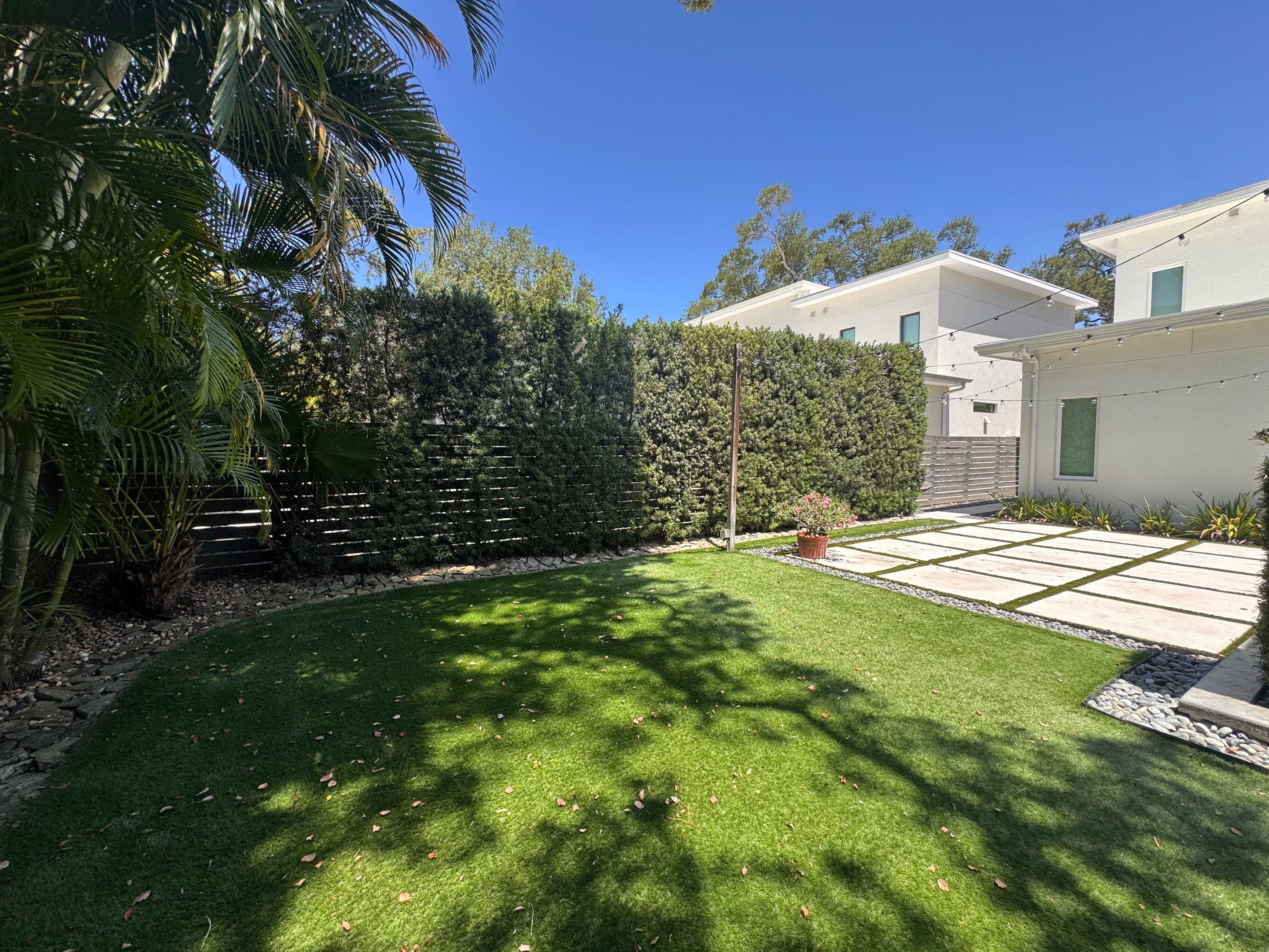 Custom Outdoor Lighting and Artificial Grass Installation in Tampa by Elegant Accents