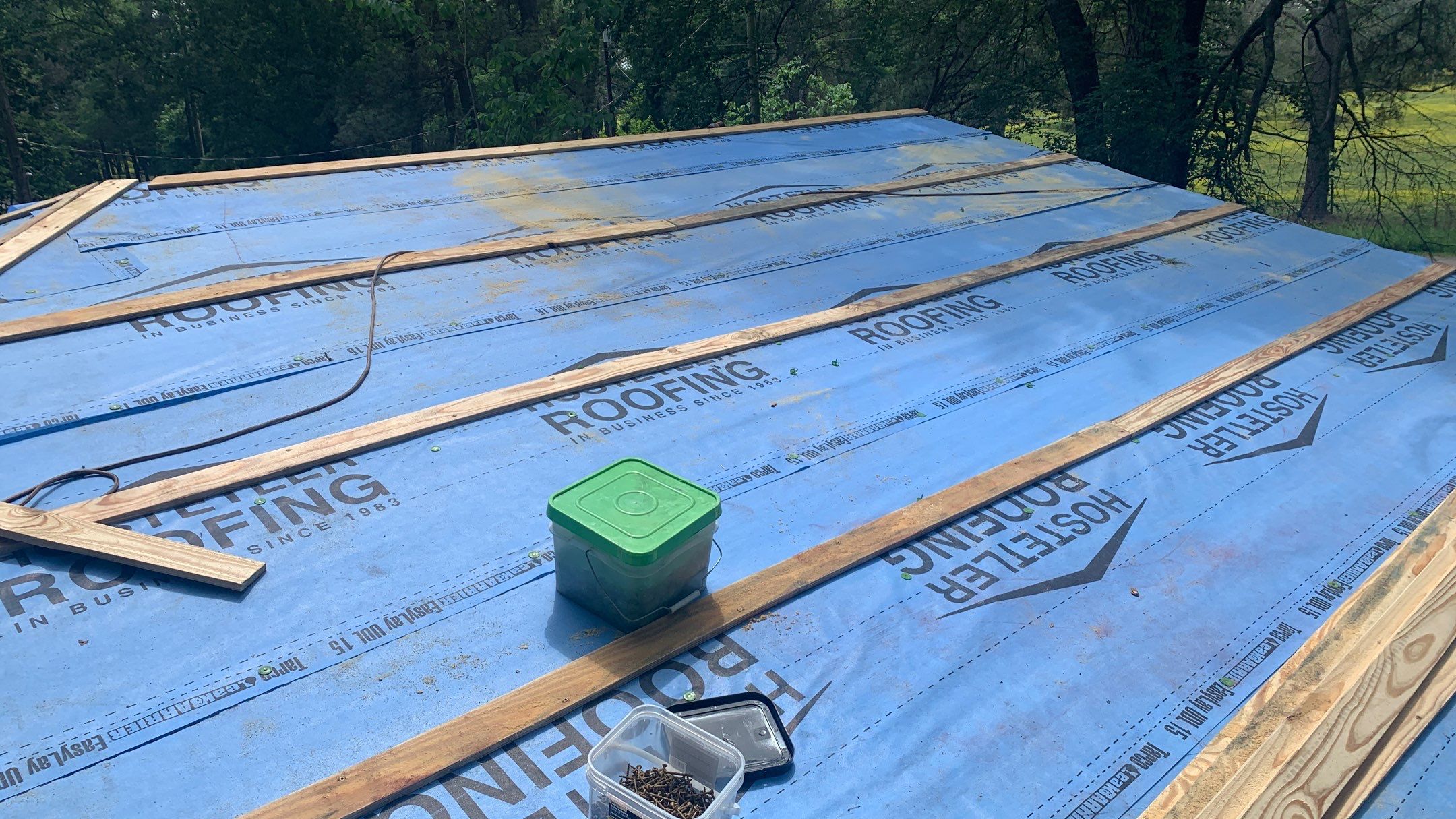Residential Shingle Reroof using 29 gauge metal by Hostetler Roofing