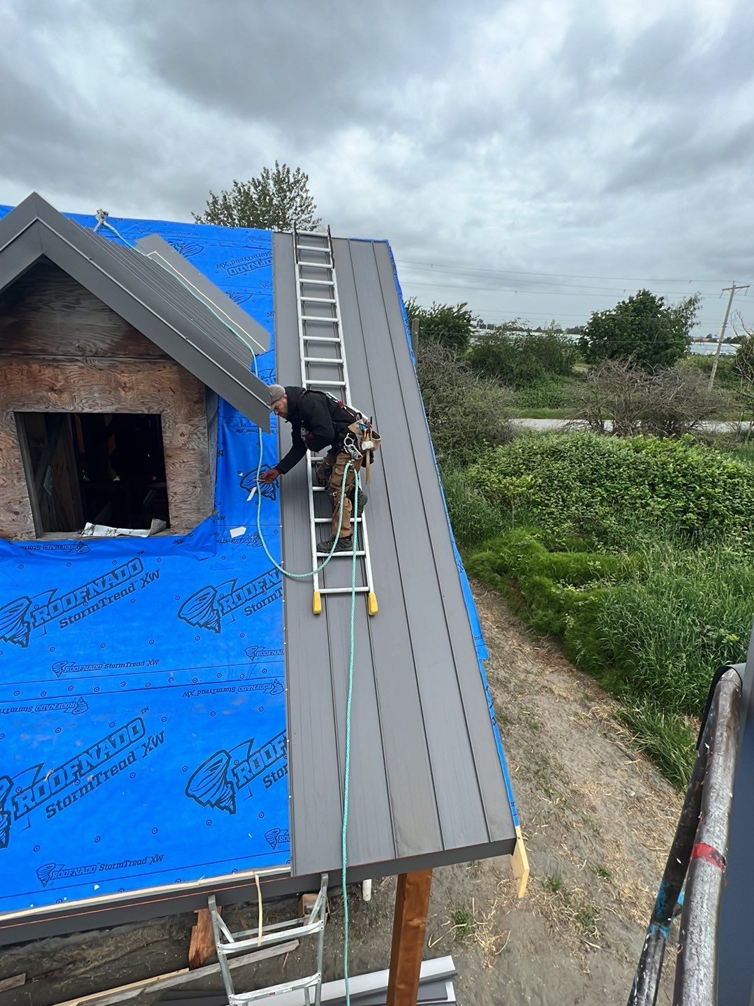 Agricultural Roofing Installation using 12" Prolok metal  by Top Notch Roofing Inc