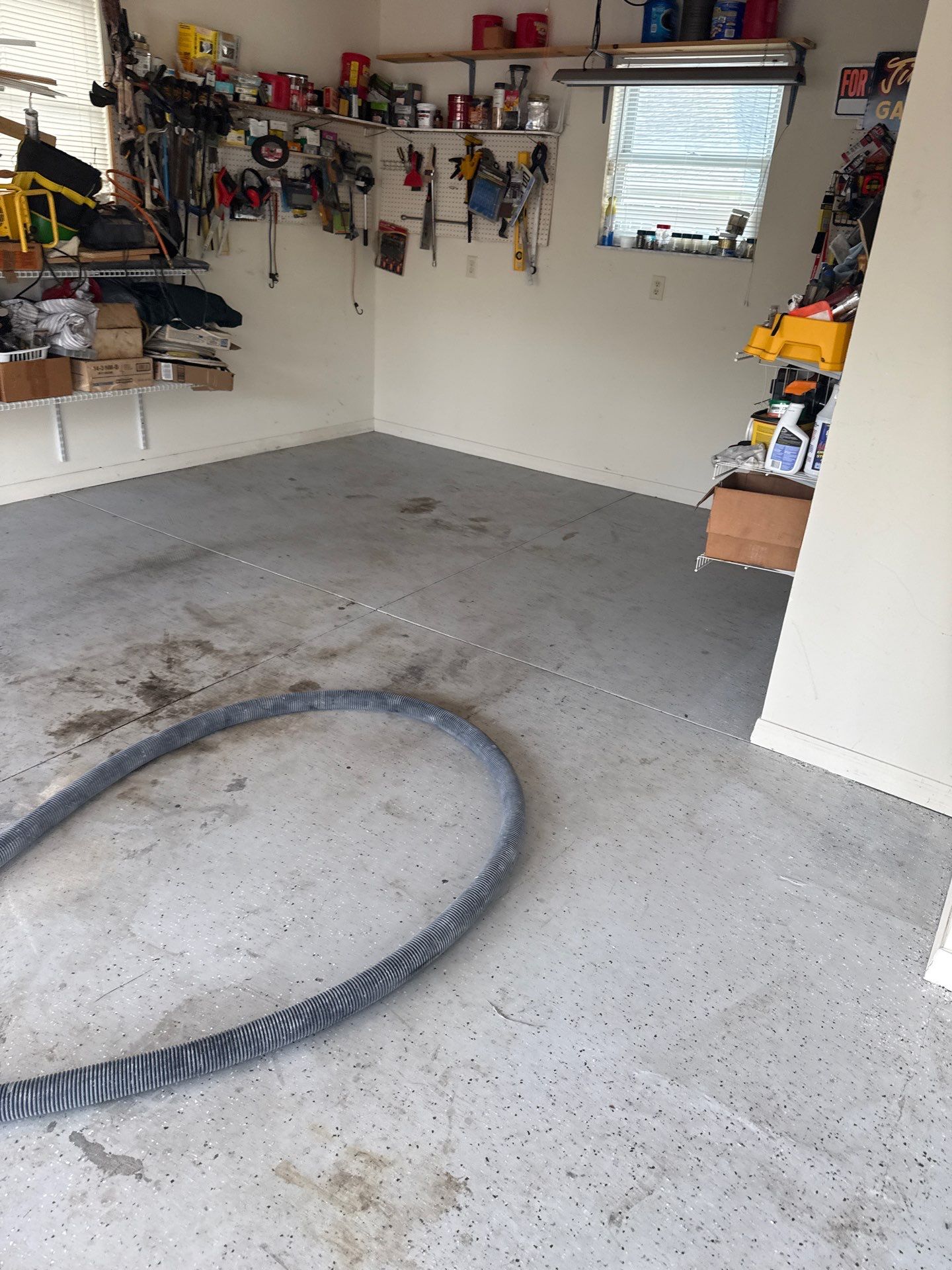 Garage, Drivewat, and Sidewalk in Landshark and Tidalwave by Innovative Concrete Coatings 