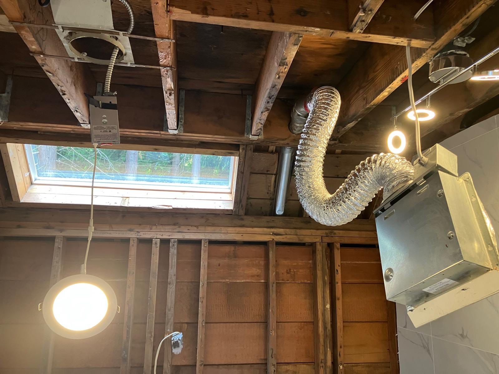 Water Damage Restoration & Bathroom Renovation in West Vancouver by YVR Construction Group