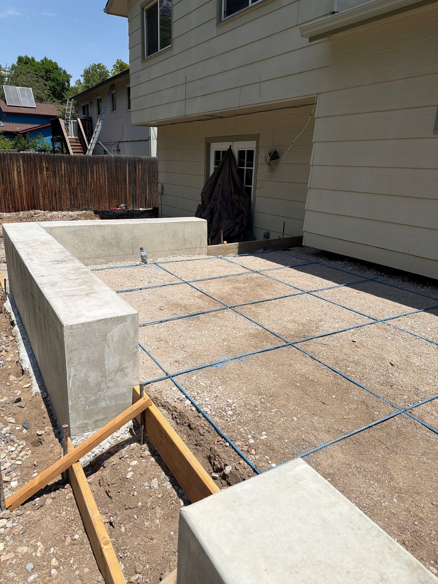 New Concrete Patio and Integrated Retaining Walls in Fort Collins by Center Line Concrete
