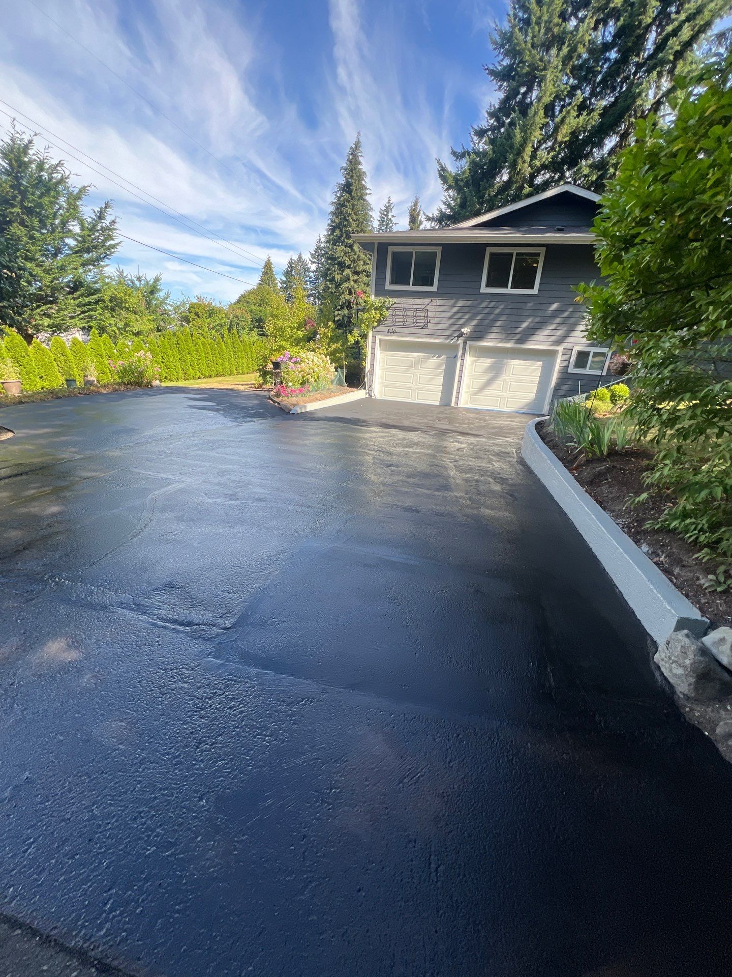 Epoxy Stairs & Sealcoat Driveway Application by Jireh Asphalt & Concrete Inc 