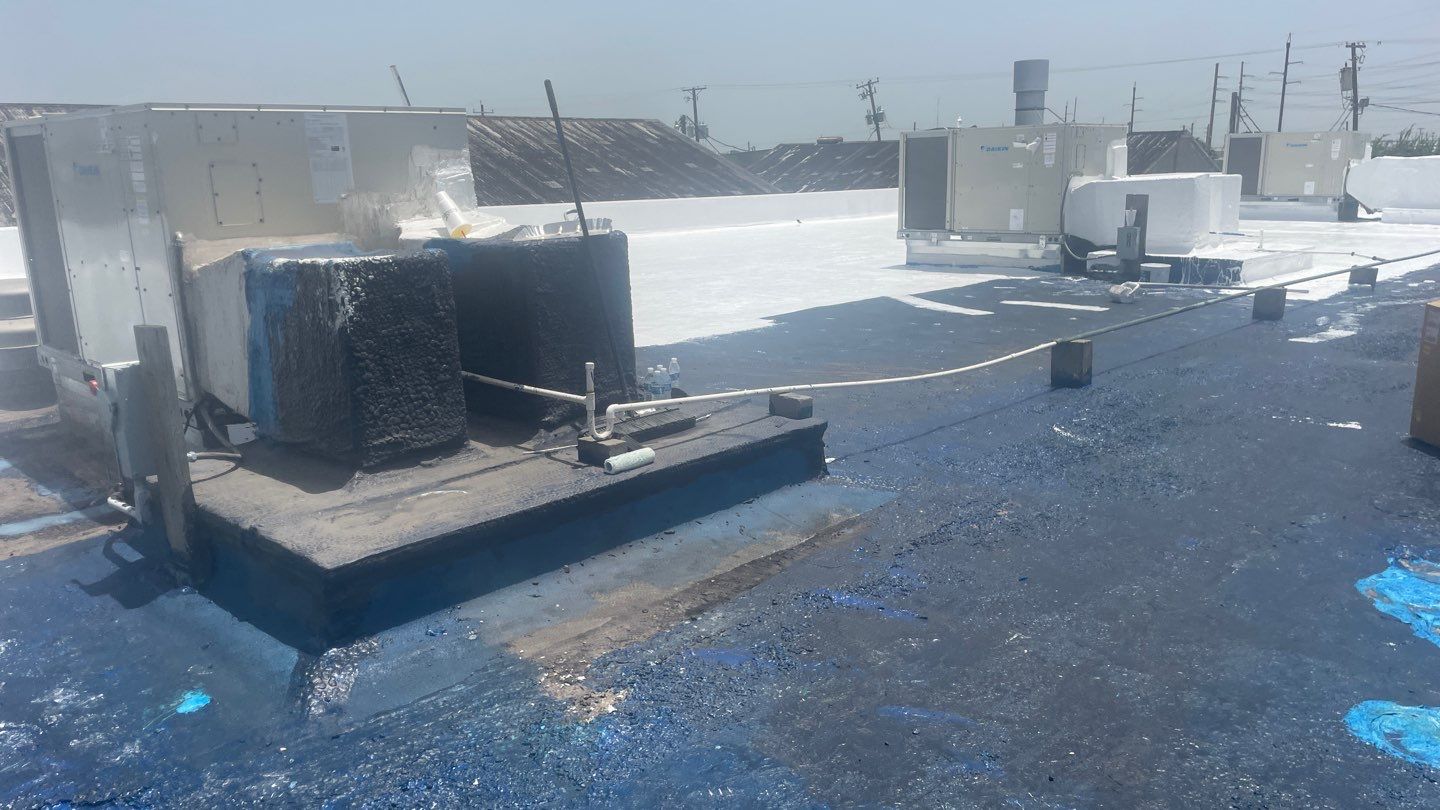 Dirty leaking Gravel Roof by Bayfront Roofing and Construction