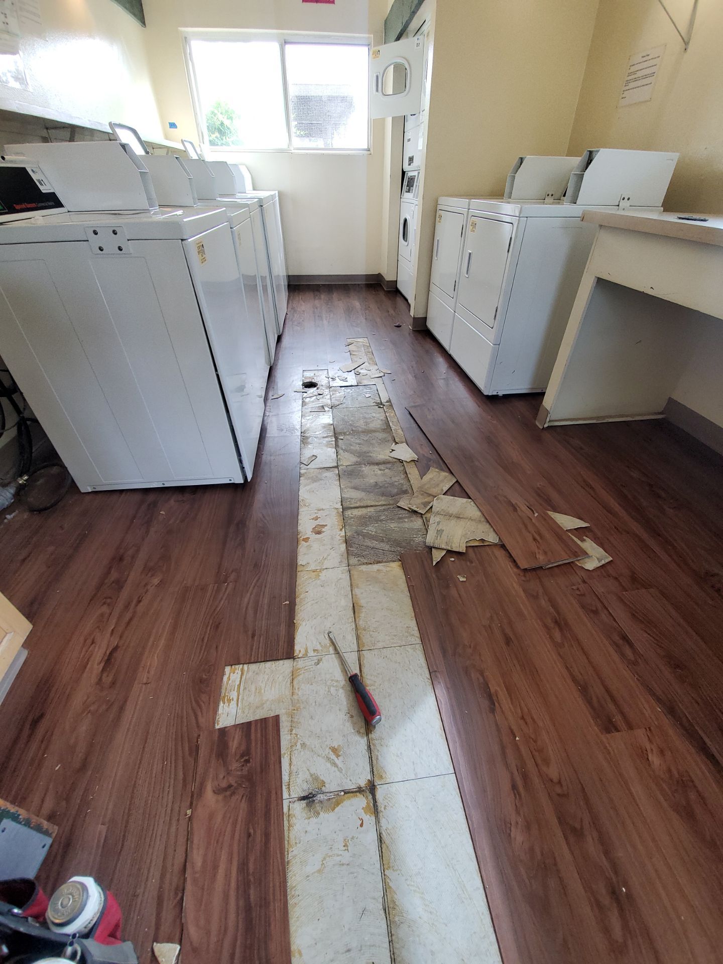 Laundry Room Water Restoration & Rebuild in Irvine by One Stop Source