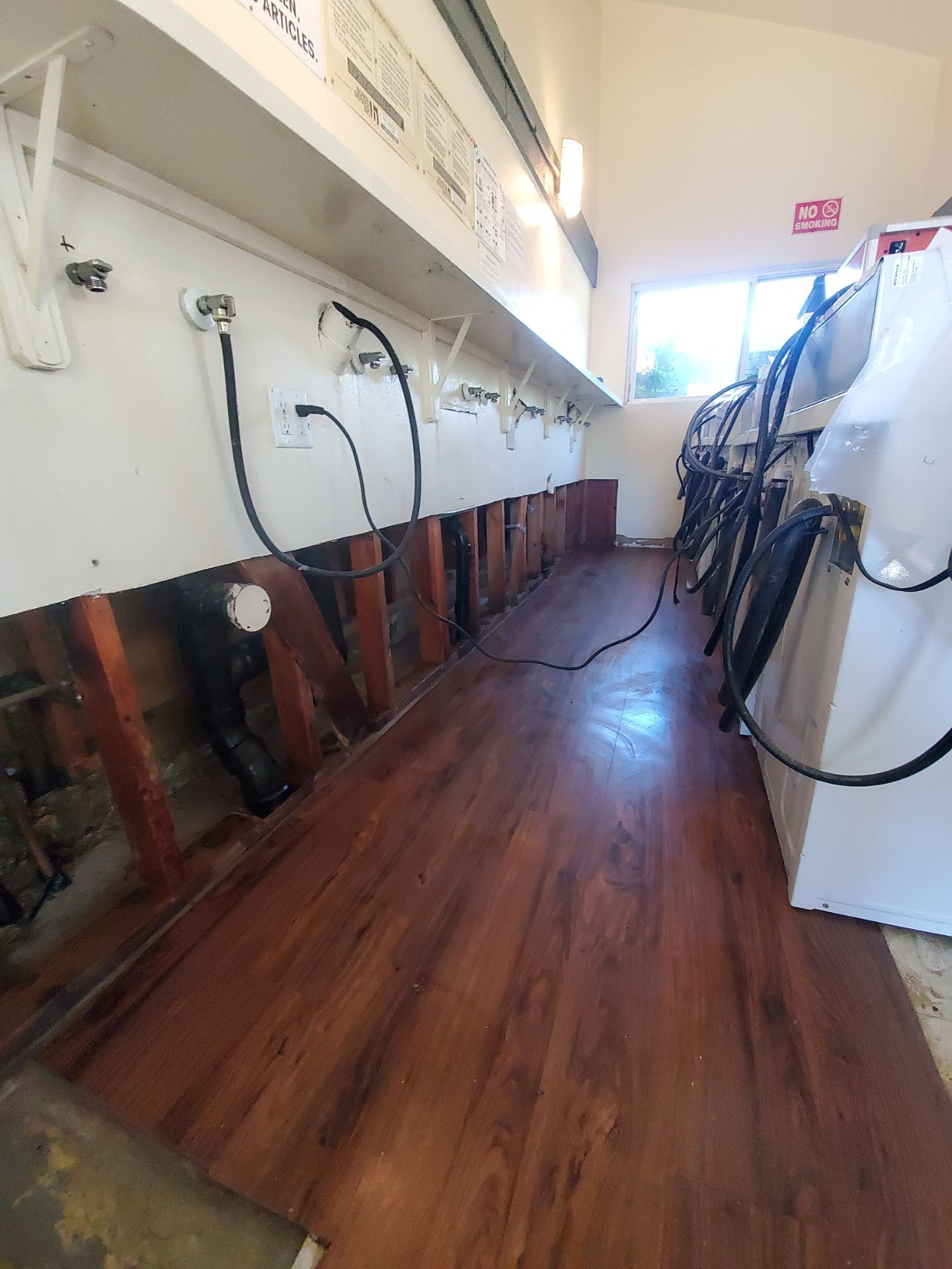Laundry Room Water Restoration & Rebuild in Irvine by One Stop Source
