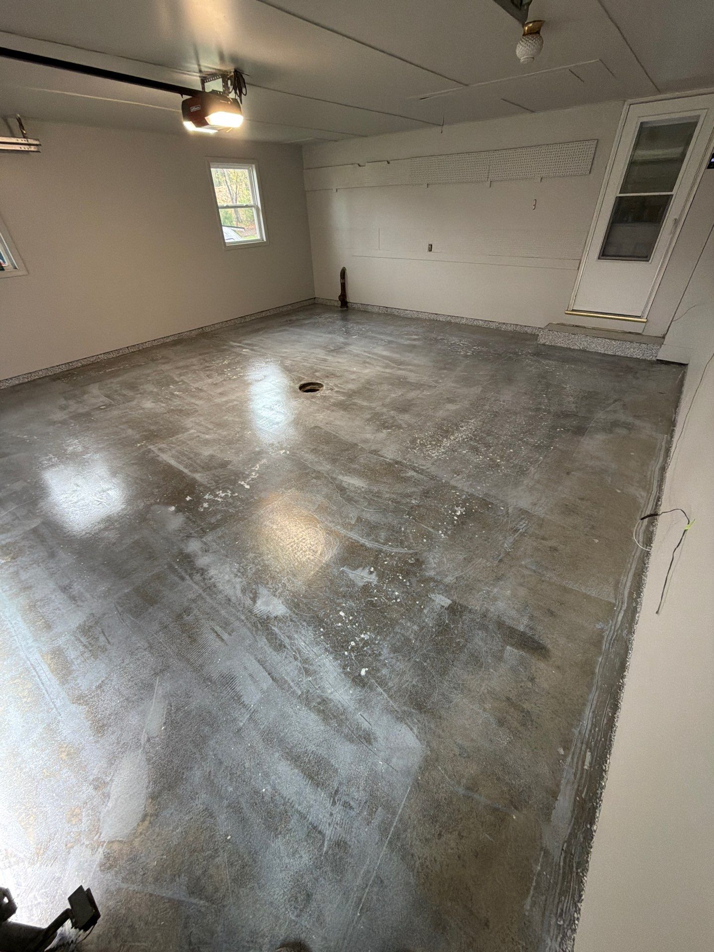 Muskegon Garage Interior Painting and Epoxy Flake Floor Installation by Gordon Painting