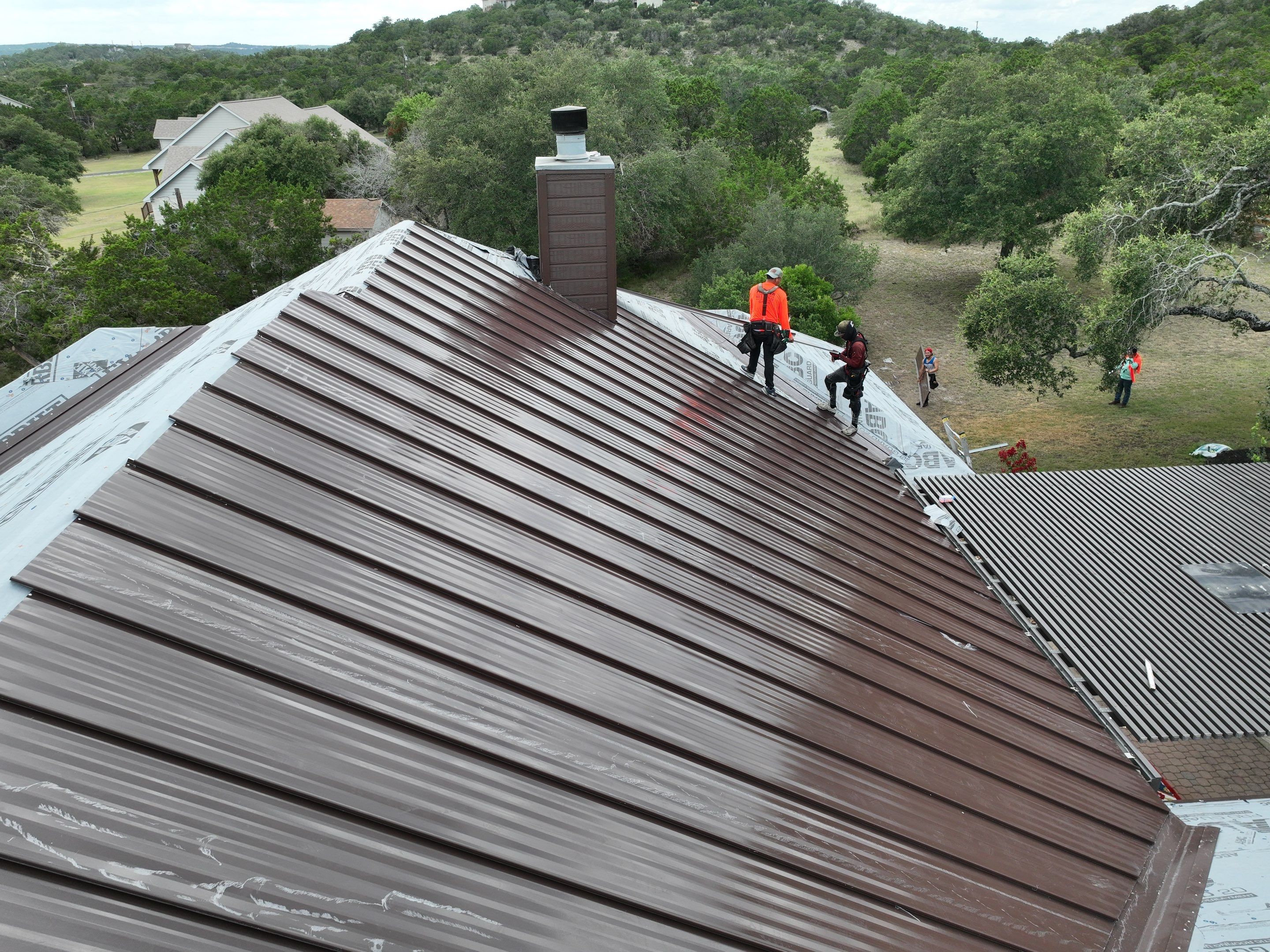 Residential Metal Roof Installation using McElroy Metal by Premier Roofing and Contracting