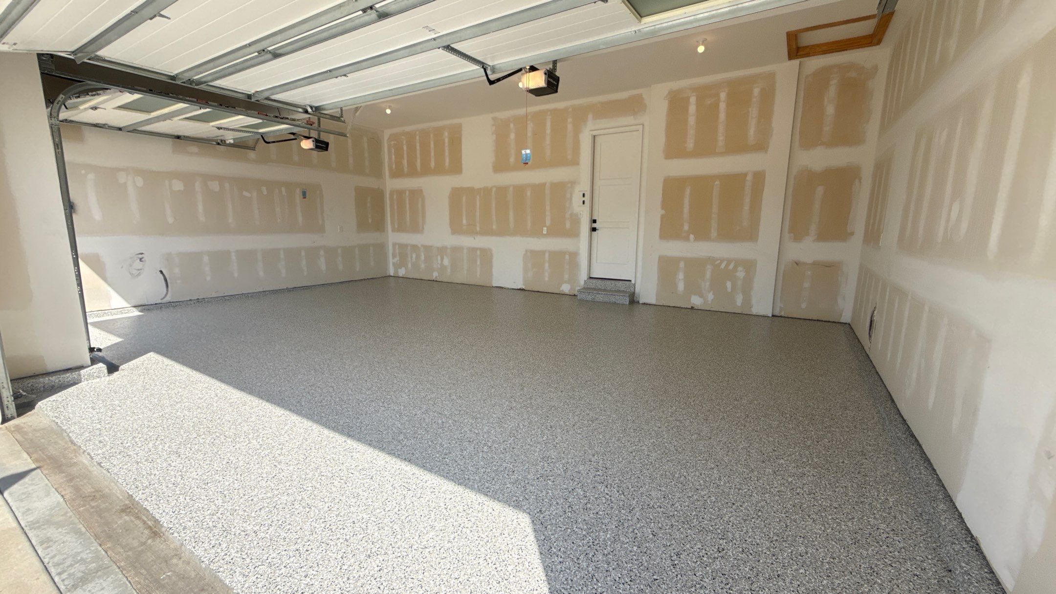 Comprehensive Garage Renovation Featuring Epoxy Flooring by Banner Garage