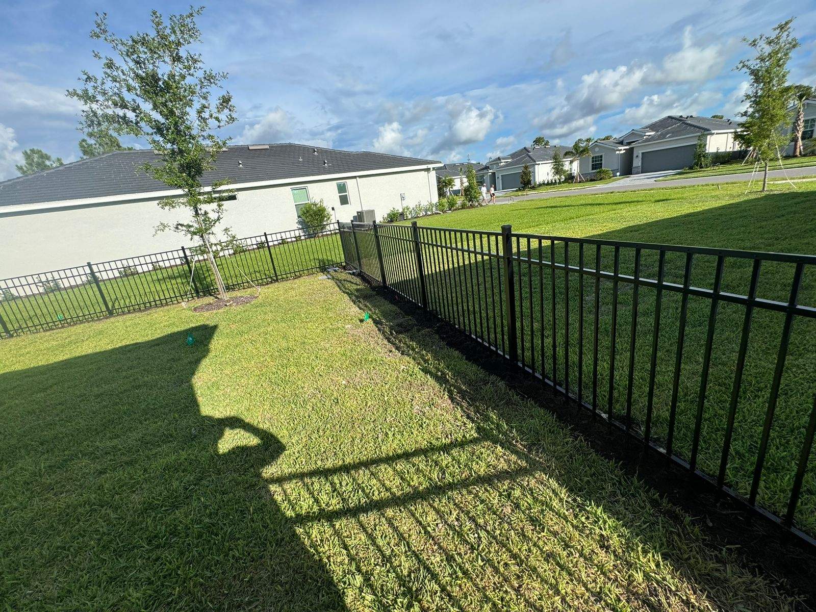 Black Aluminum Picket Fence Installation in Venice, Florida by True Fence LLC