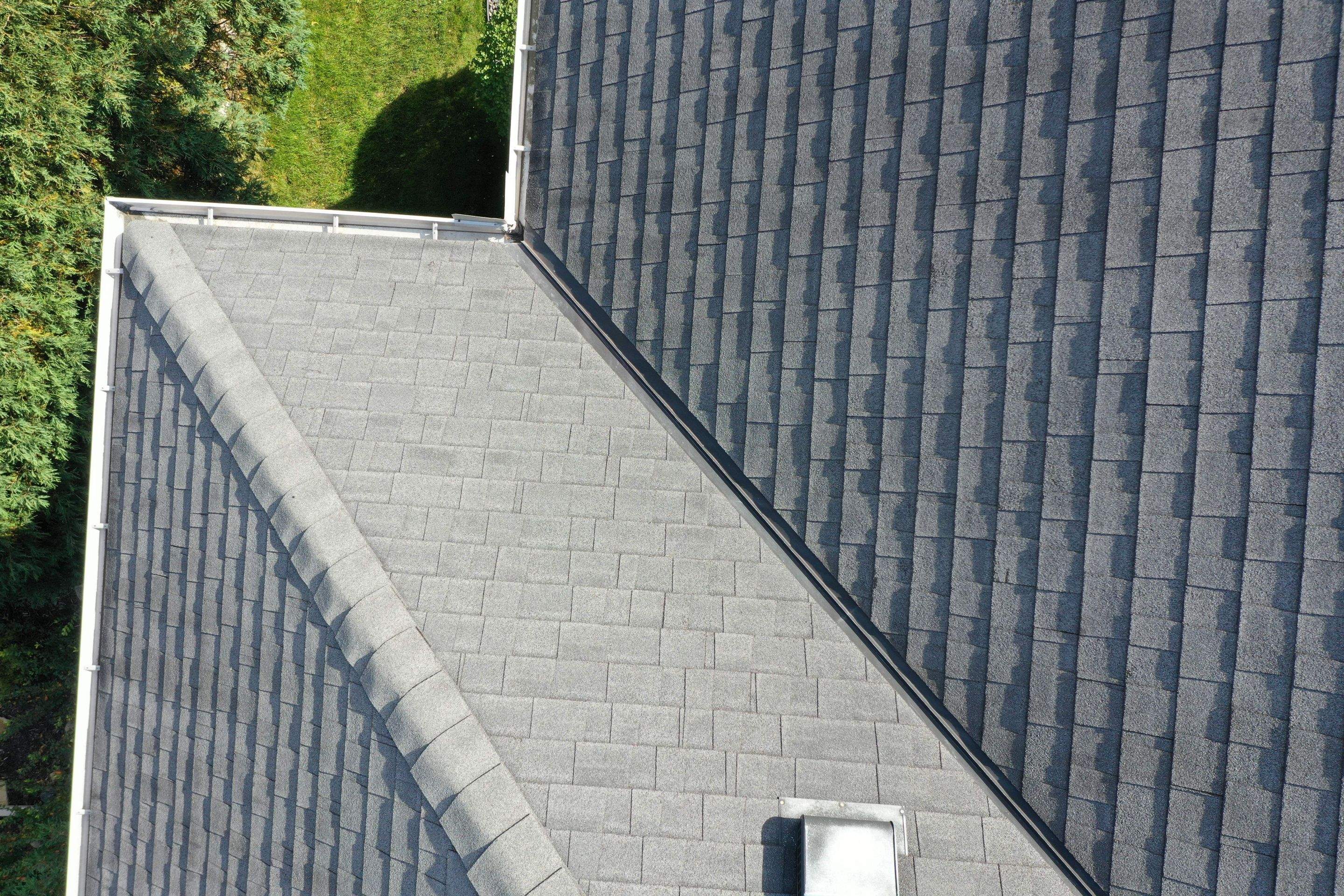 Residential Roofing Installation using Certainteed Landmark Moire Black by MODERN EXTERIOR SYSTEMS