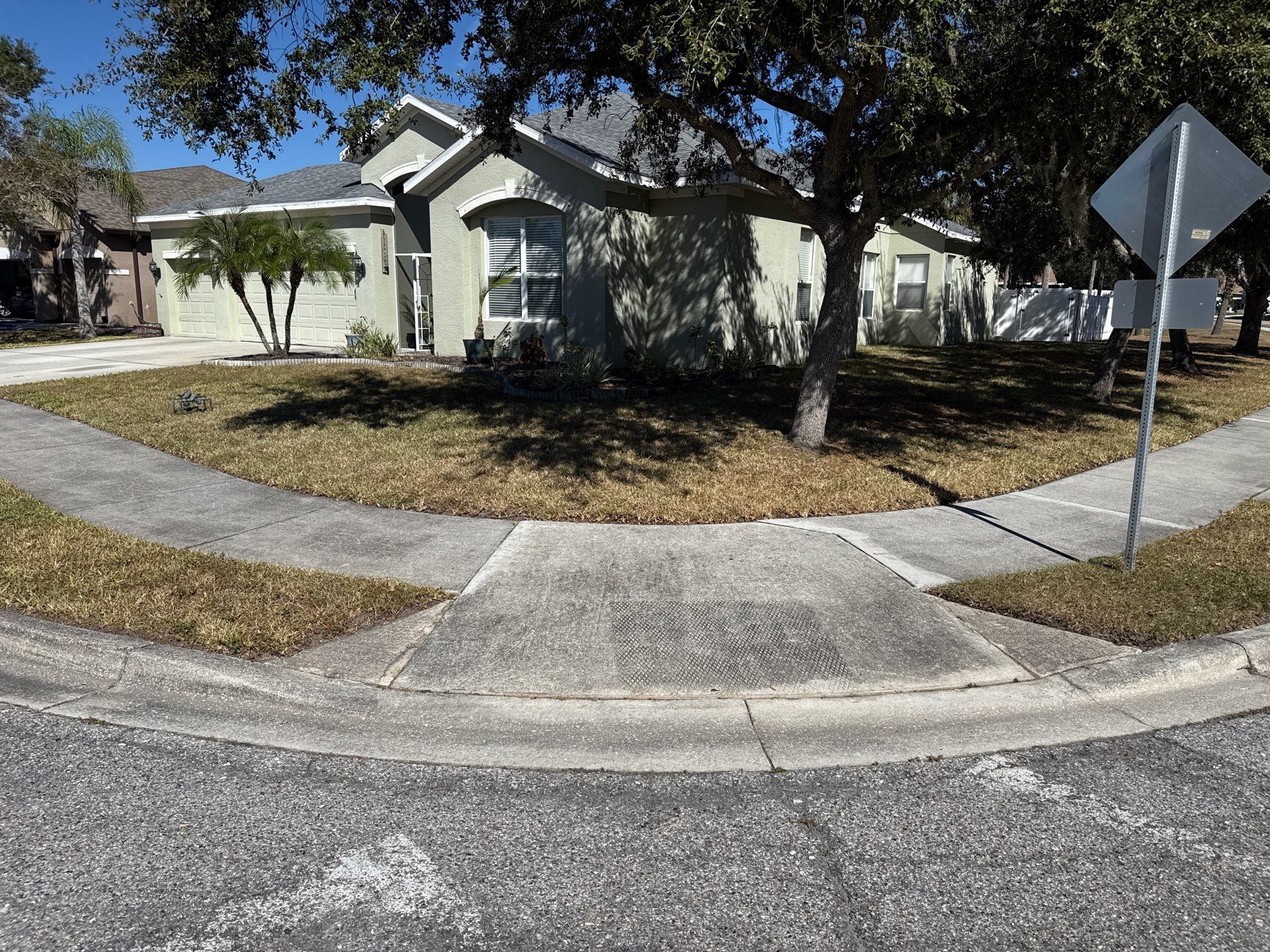 Driveway & Sidewalk Cleaning Transformation | Kingsfield Lakes, Parrish FL by Sunshine AquaWash