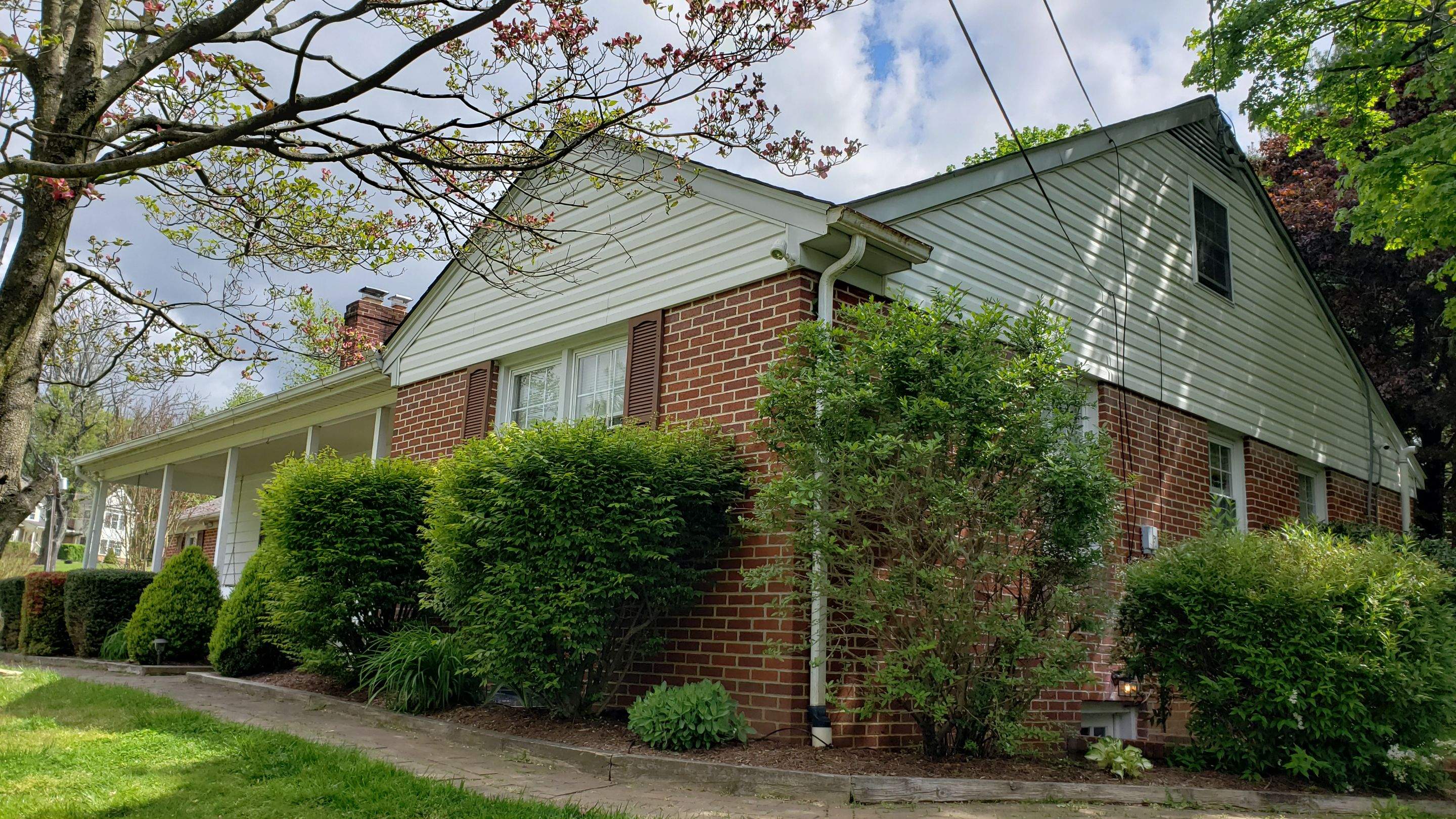 Gutter and Siding Replacement by American Home Contractors