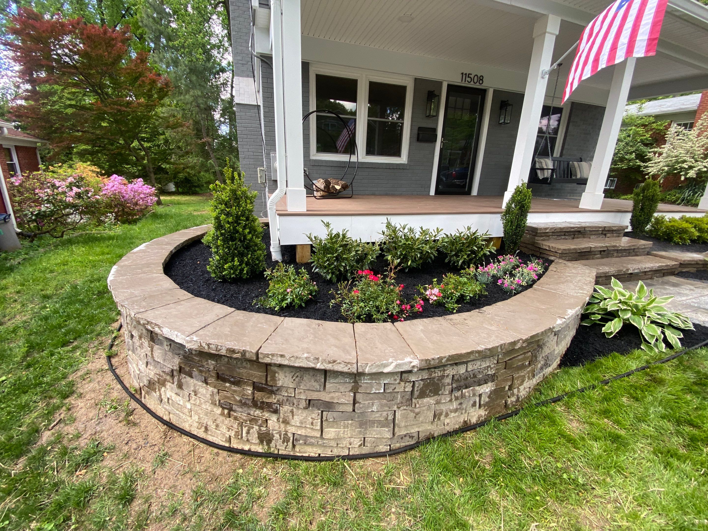 Retaining wall, walkway, small patio and landscape install by The Smet Companies, LLC