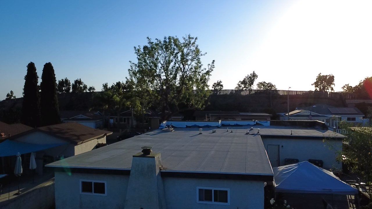 Oceanside Mansard TPO & Shingle Roof Replacement by Zenith Roofing Services