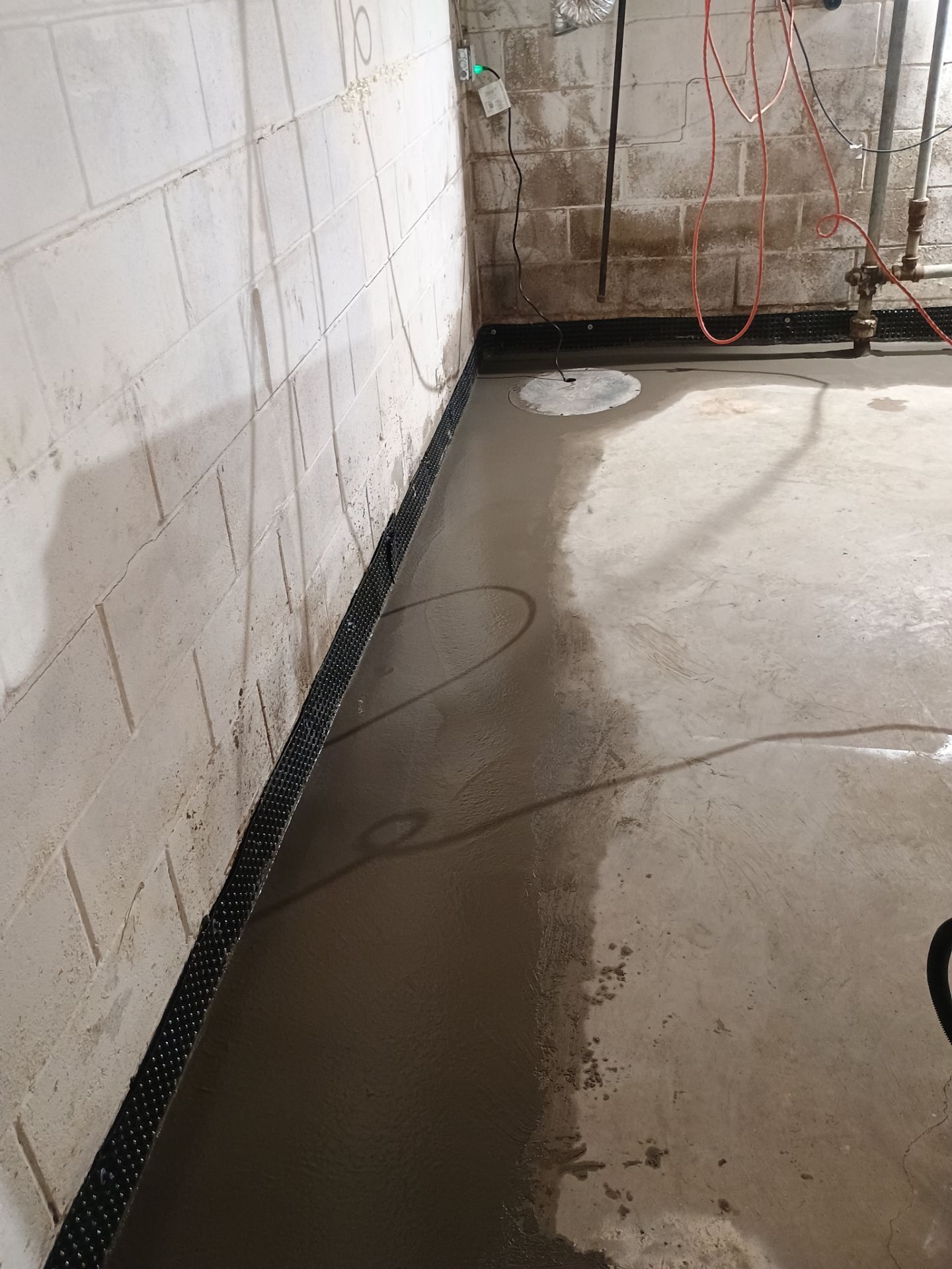 Interior Drain Tile Installation near Columbia Heights, MN by Waterproofing Northeast