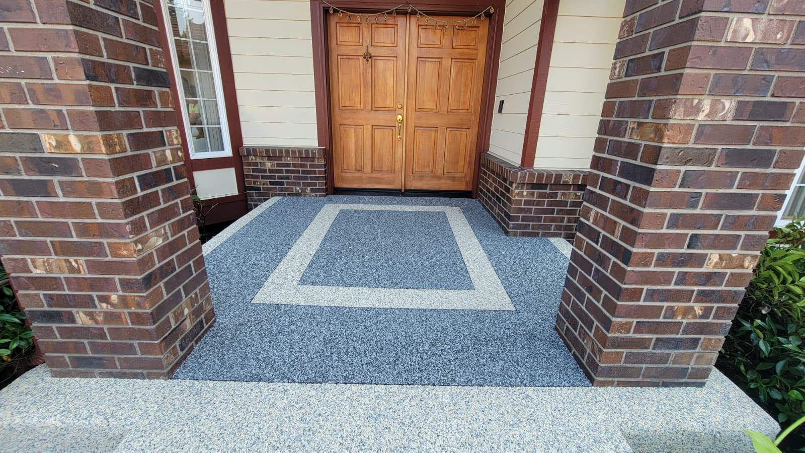 Elegant Walkway and Patio in Palazzo and Santorini Vuba Stone  by Concrete Coating Experts Inc.