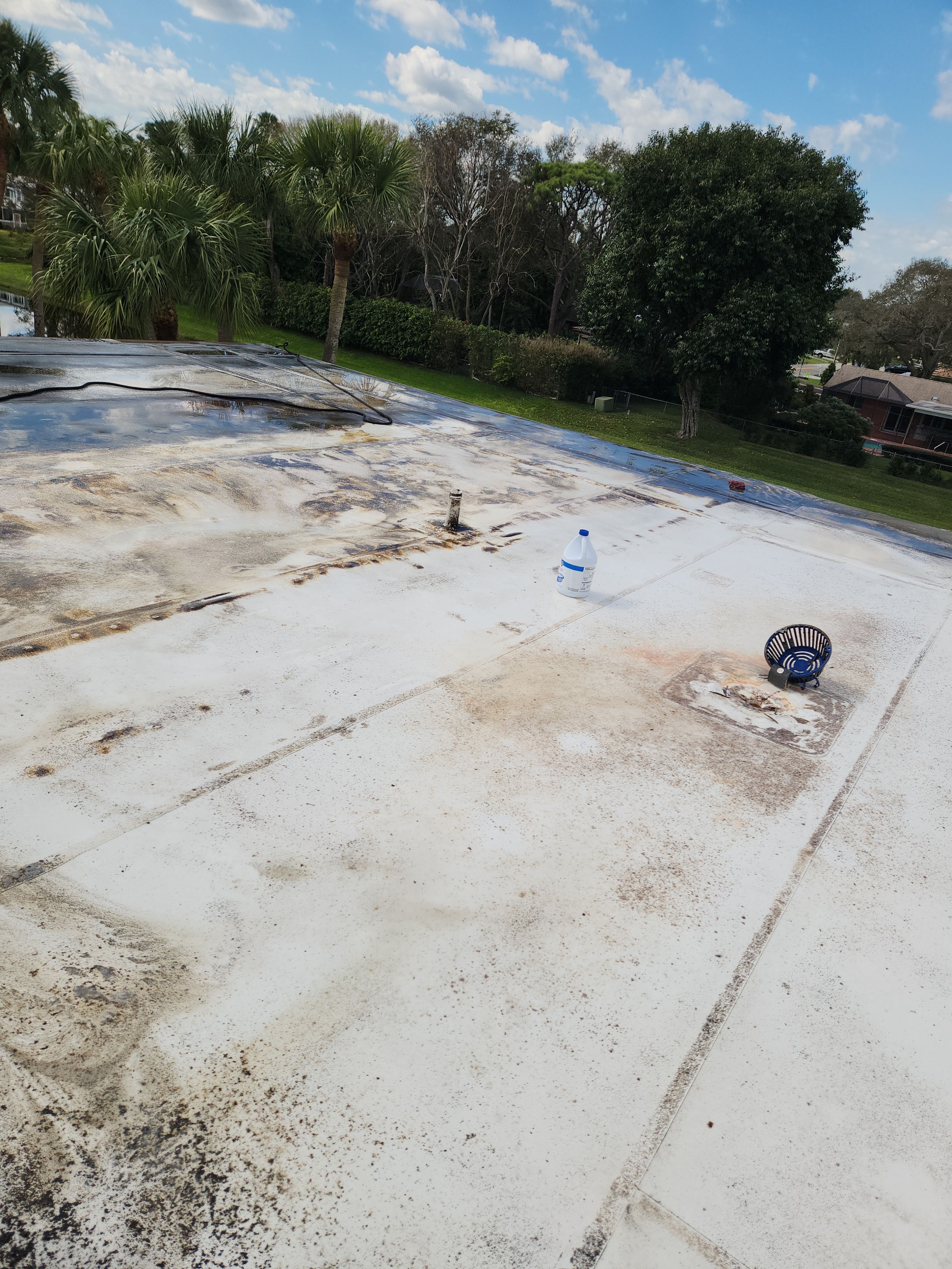 Reflective Silicone Roof Coating and Maintenance in Palm Beach Gardens by Aastro Roofing