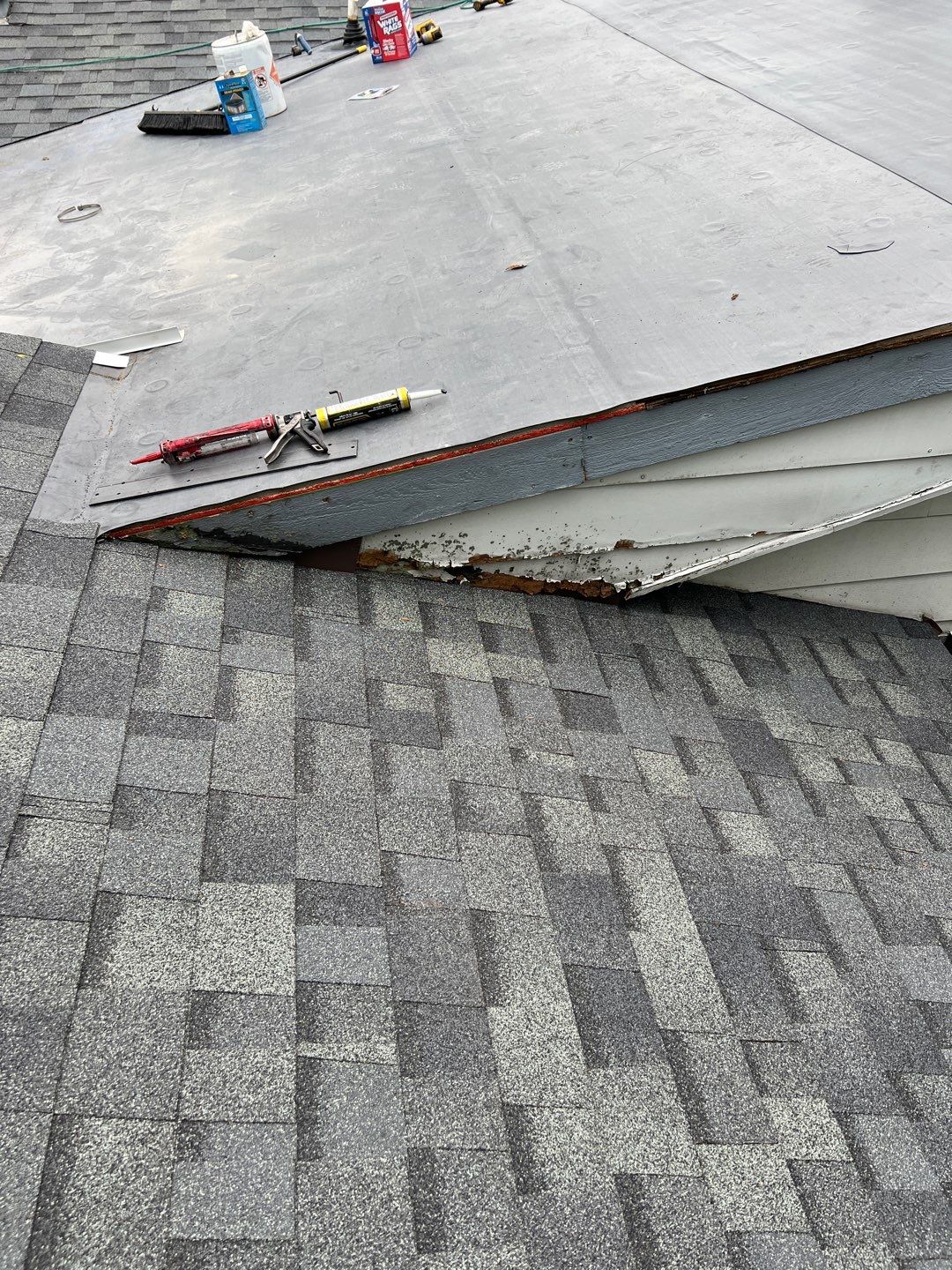 Residential Roofing Installation using 60 mil rubber roof  by Nitro Roofing and Construction