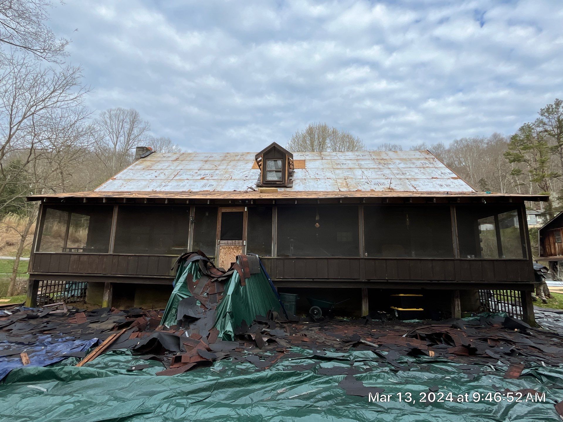 Residential Roofing Installation using Union Corrugatting Metal Roofing and Seamless Gutters by Fahey Roofing + Contracting